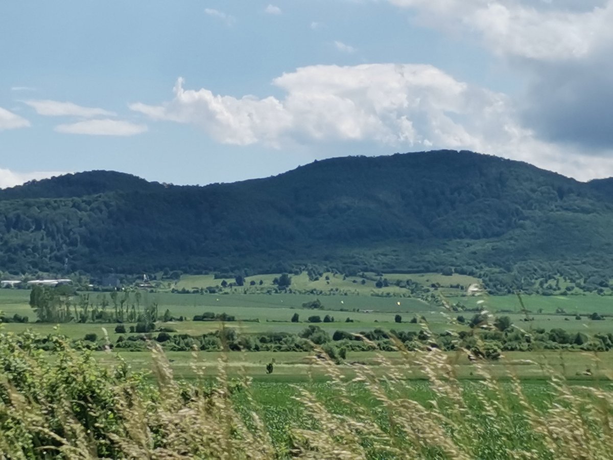 Rural landscape and weathered road documented near Ihtiman, Bulgaria