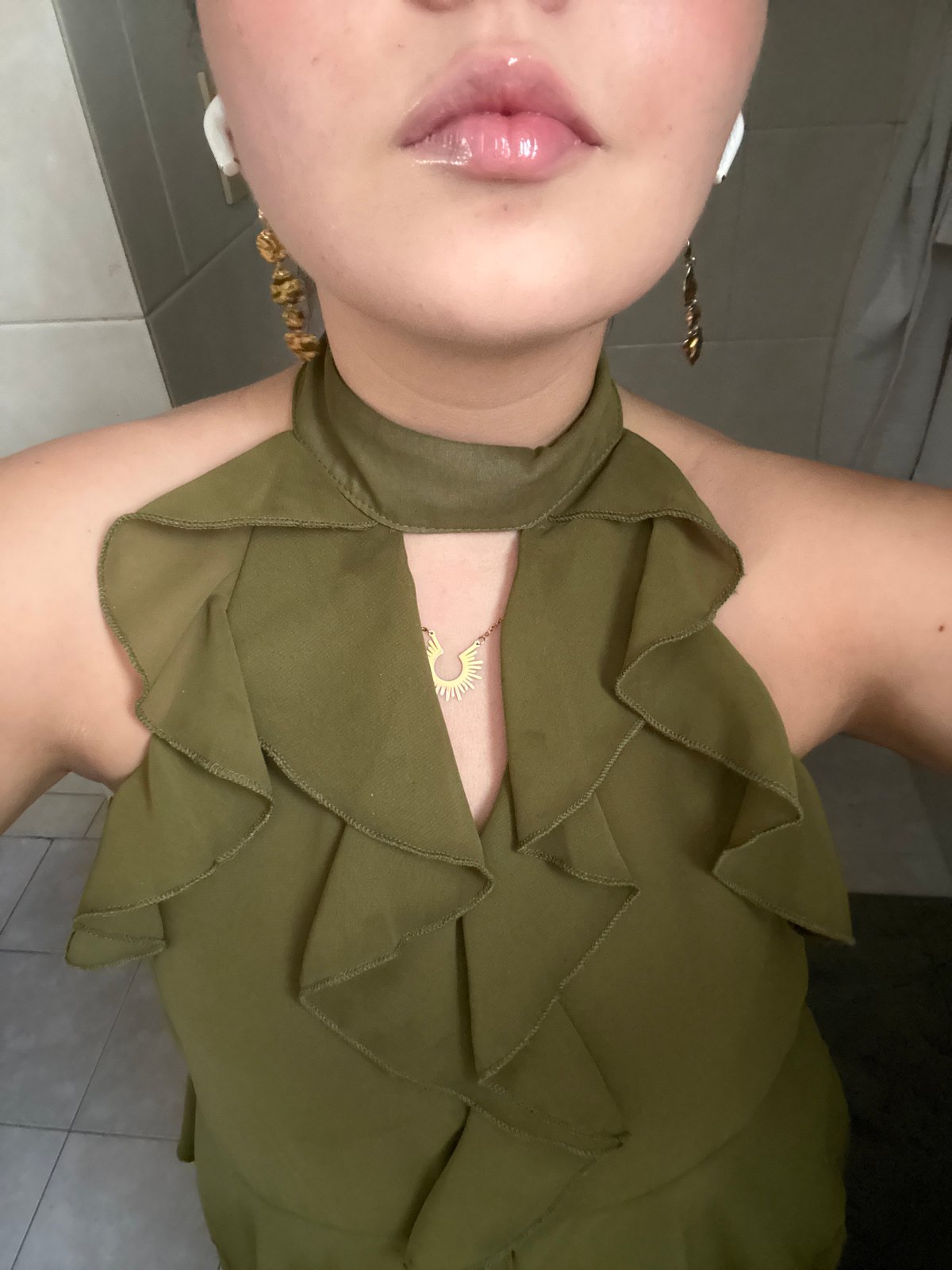 Woman takes bathroom selfies while applying makeup in Mexico