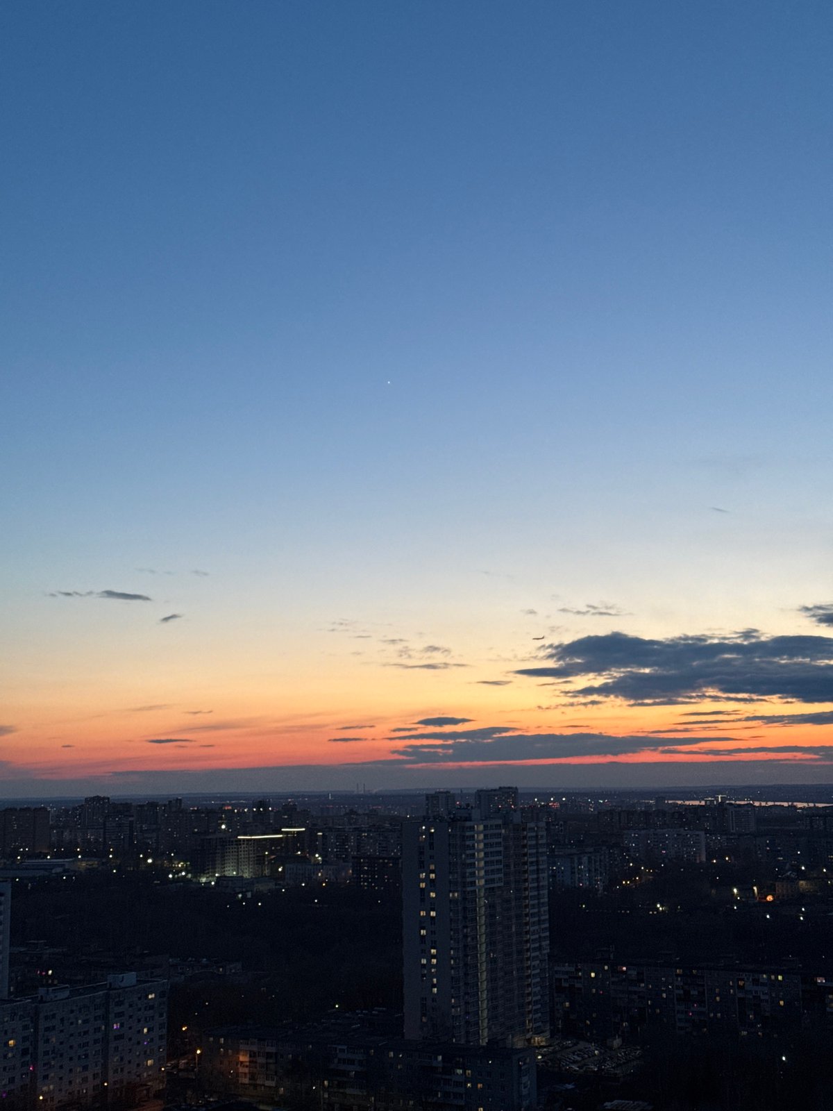 Twilight skyline view captured from high vantage point in Perm