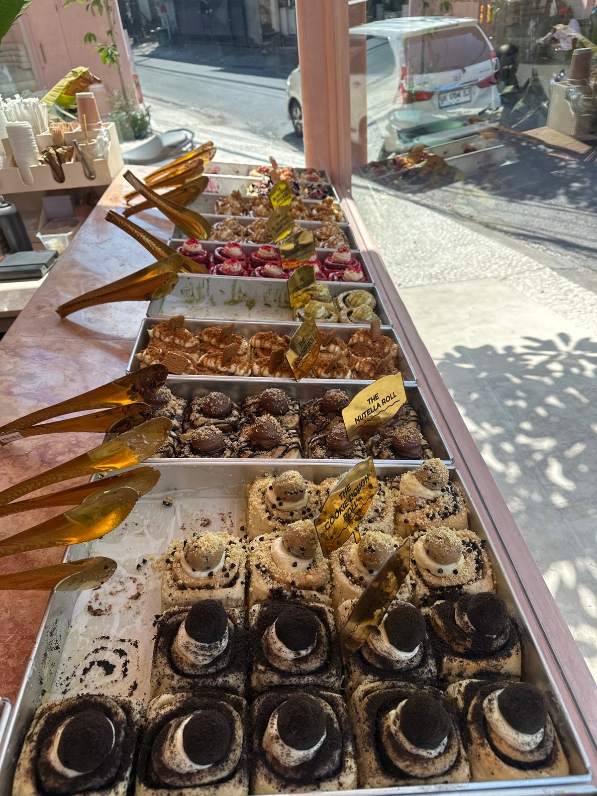 Inside a pastel cinnamon roll café in North Kuta, Bali