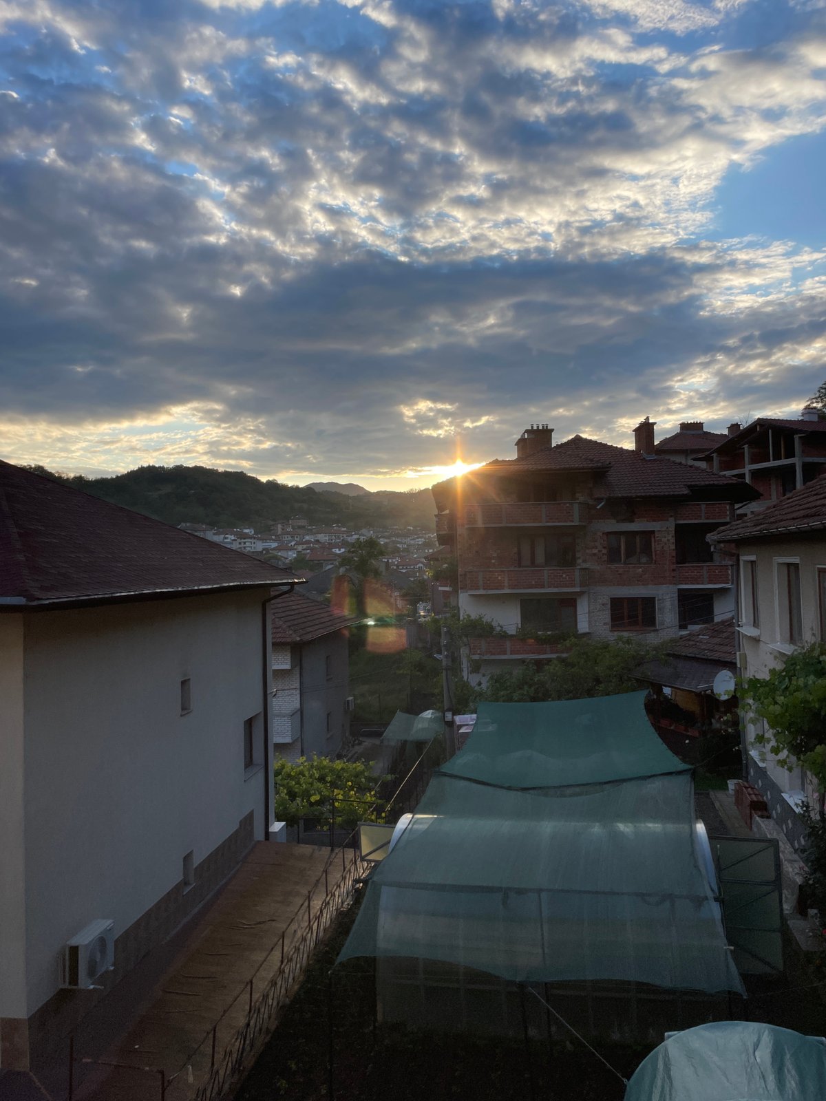 Dramatic sunset captured over Zlatograd, Bulgaria residential valley