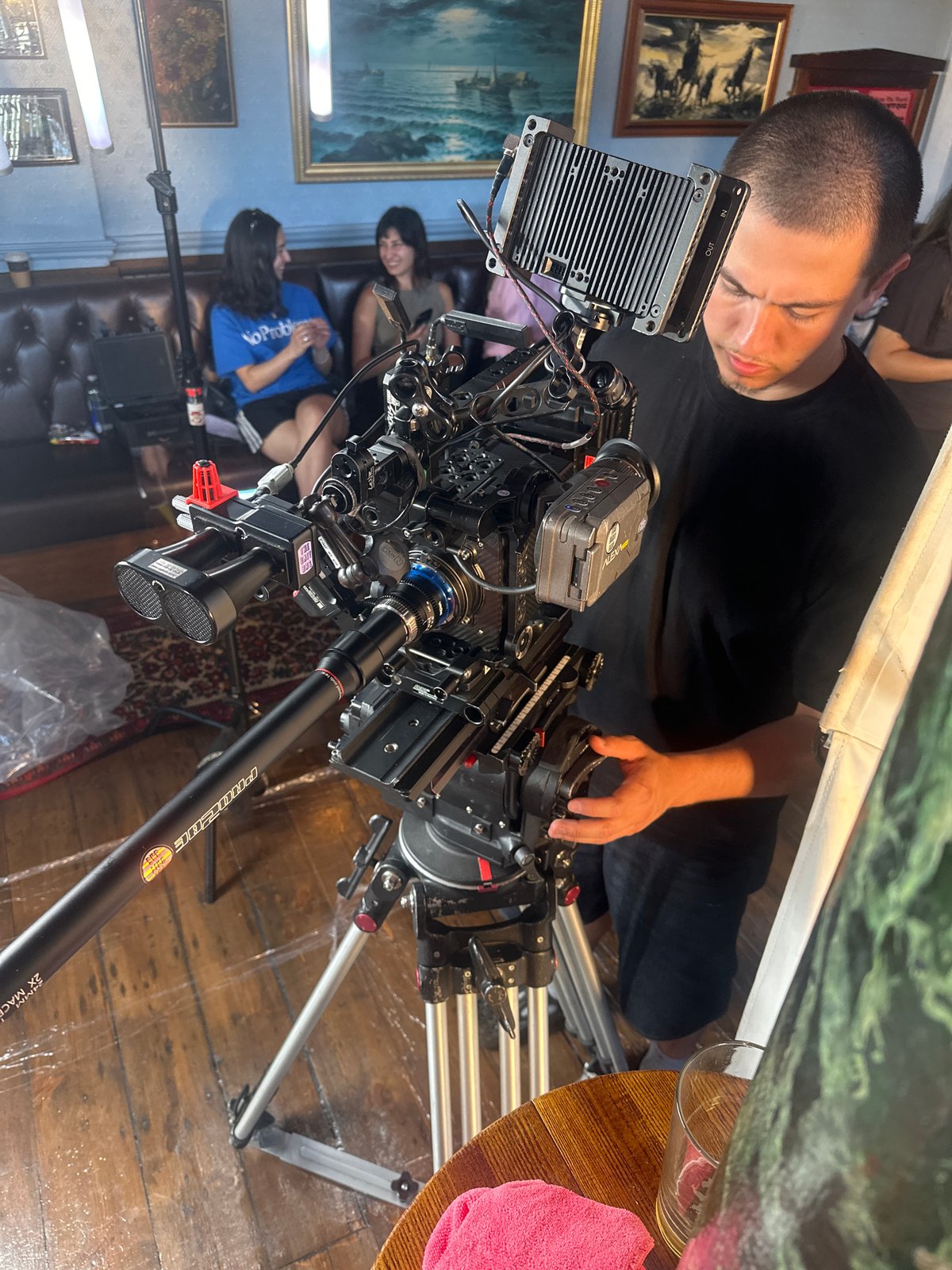 Film crew shoots scenes inside London pub
