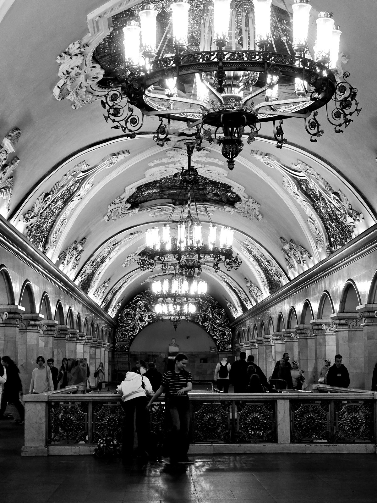 Busy subway station scenes captured during afternoon rush hour