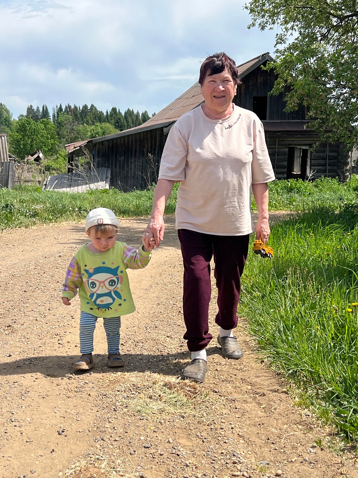 Spring morning family time captured in rural Russian village
