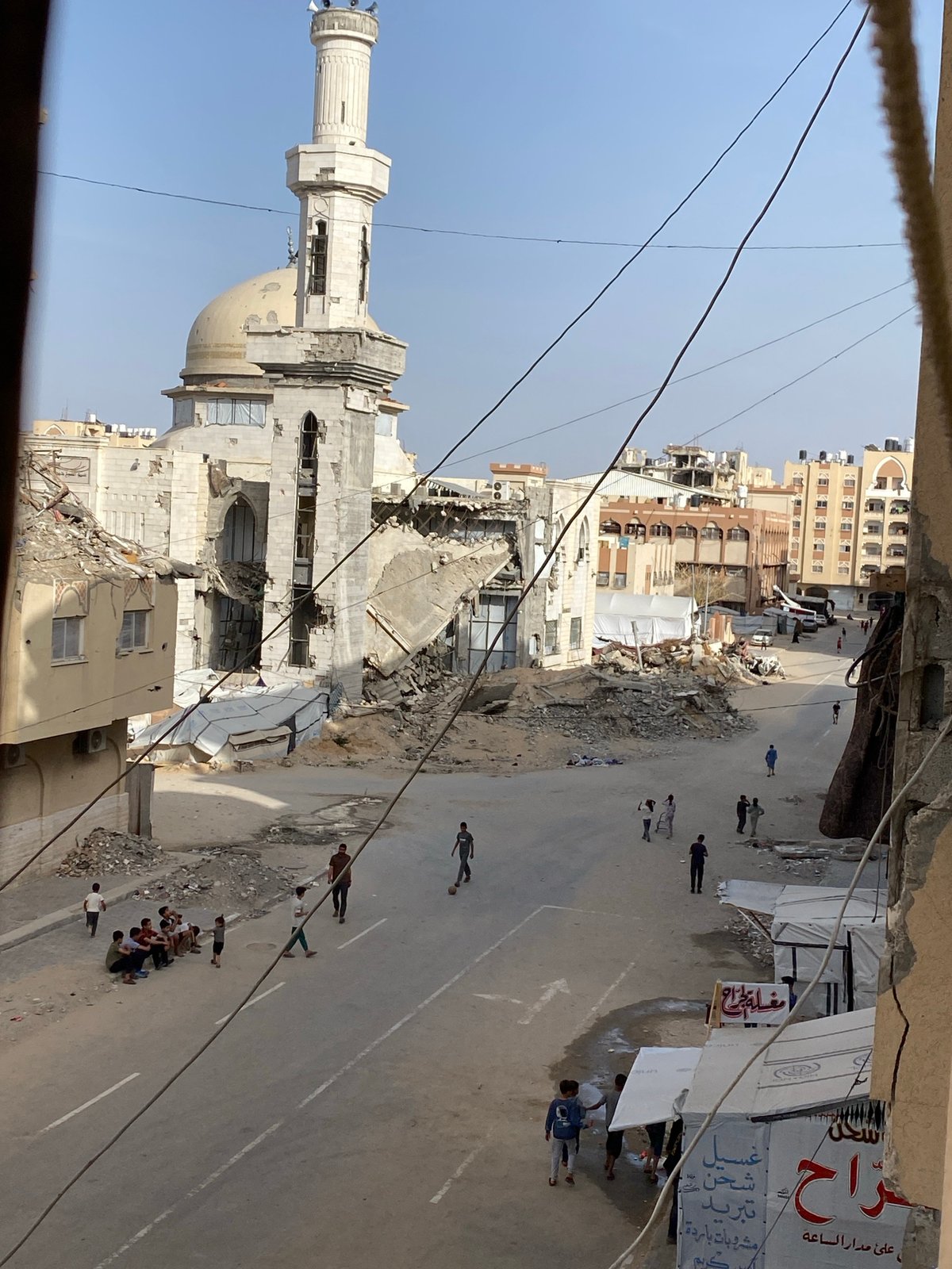 Children play amid destruction in Khan Yunis refugee areas