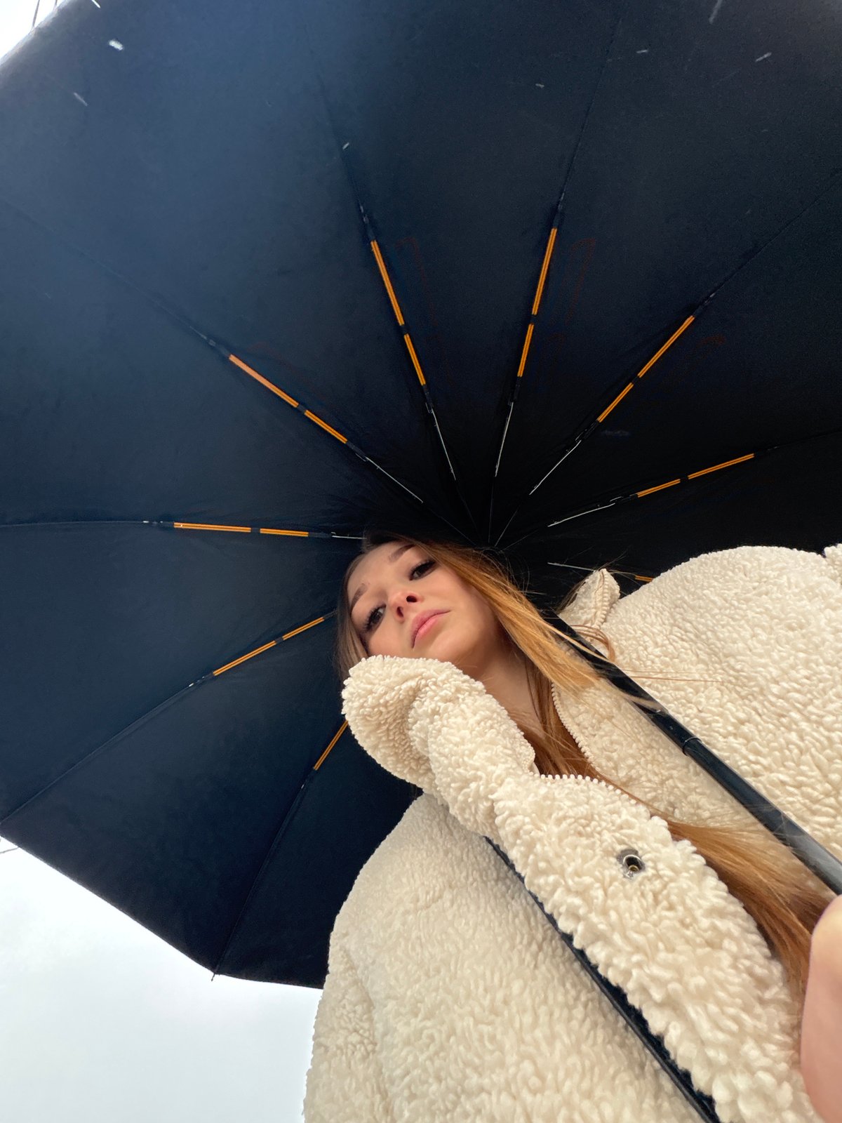 Daily life documented across Chaikovsky, Russia during rainy afternoon