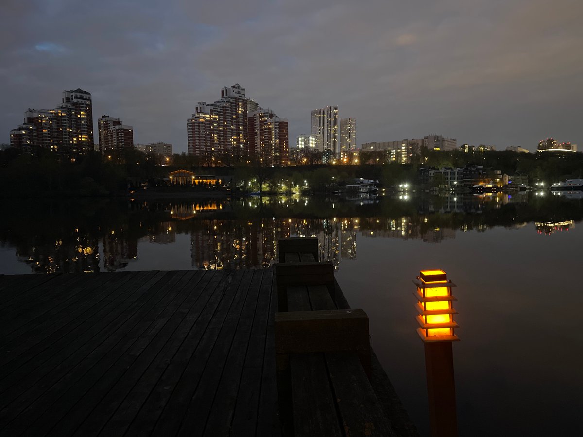 Evening barbecue dinner captured along Moscow waterfront
