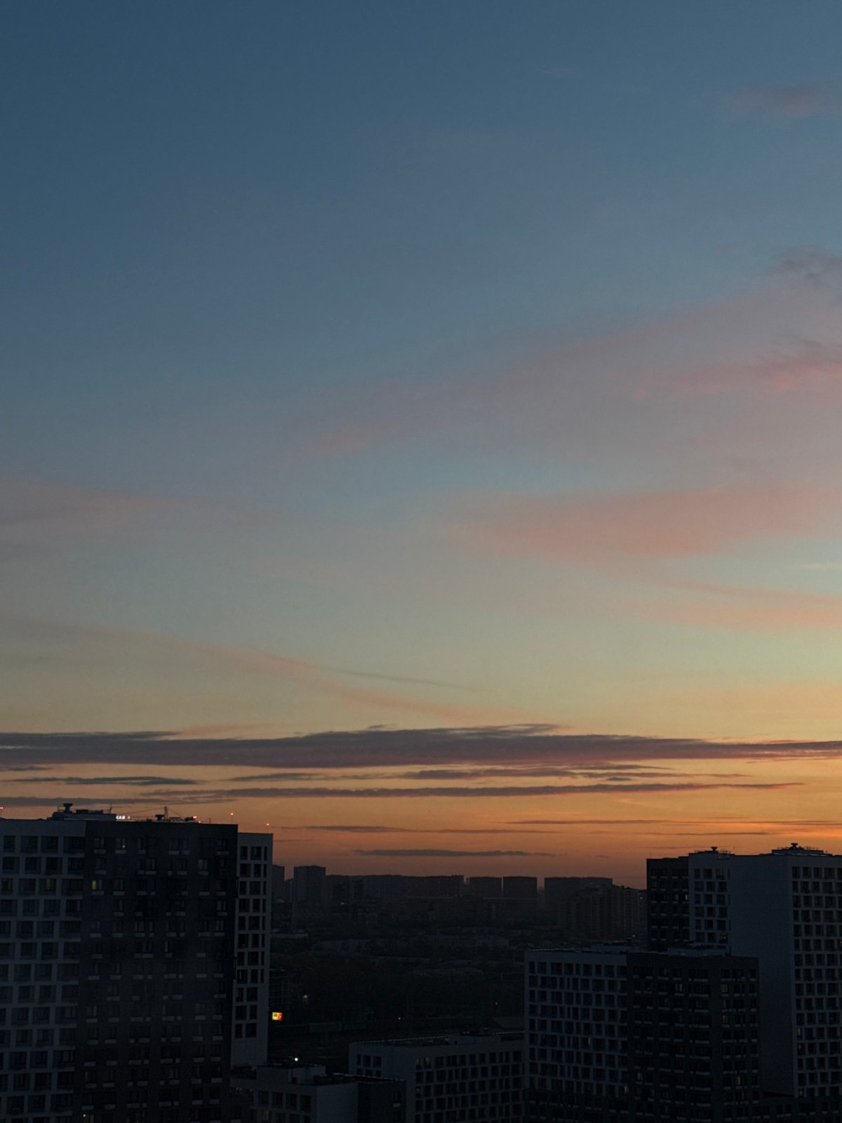 Evening twilight observed over Lyubertsy apartment buildings