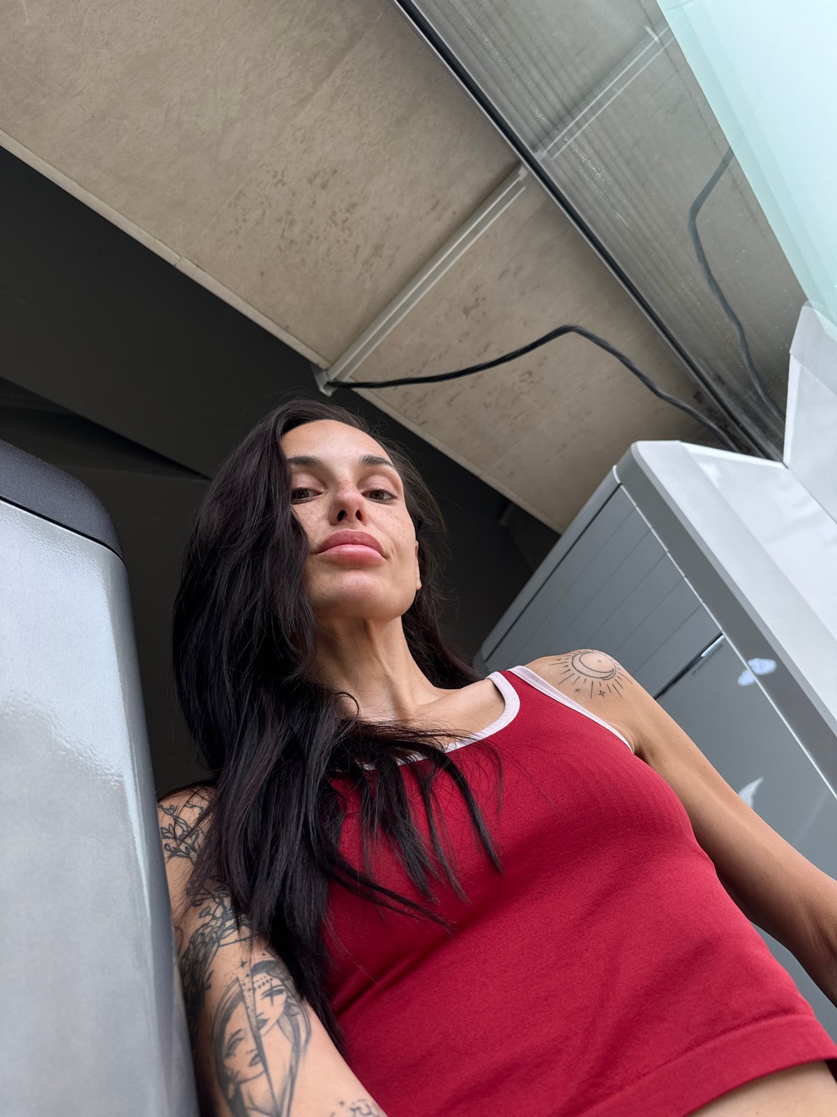Woman takes morning gym selfies in Pleven, Bulgaria