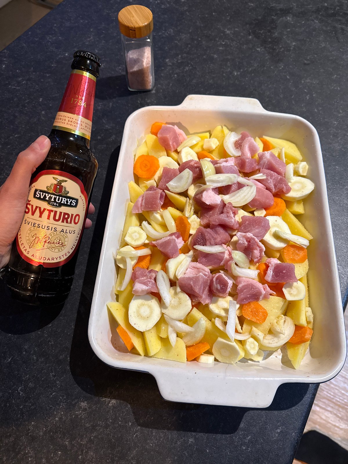 Home cook prepares meat and vegetable dish in Great Yarmouth