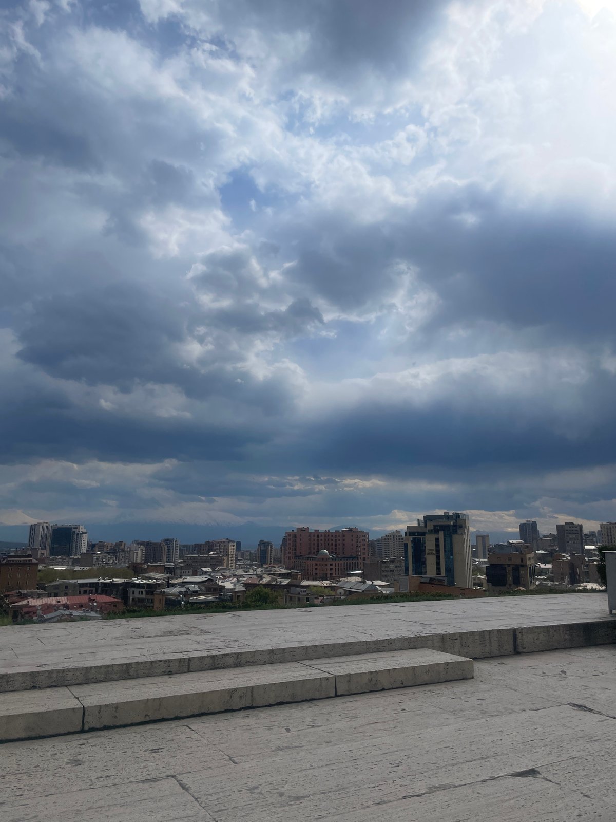 Dramatic clouds photographed over Yerevan from elevated viewpoints