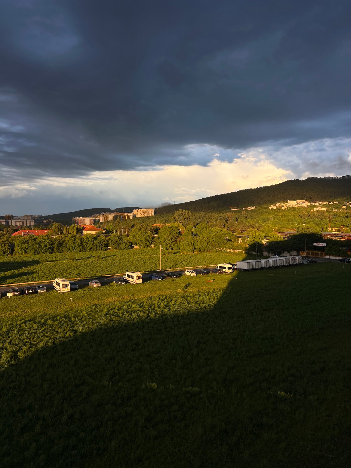 Golden hour hits Florești as storm clouds gather nearby