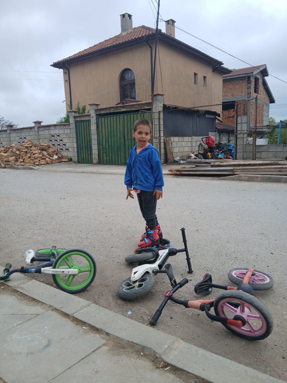 Young boy learns to roller skate in Bulgarian village