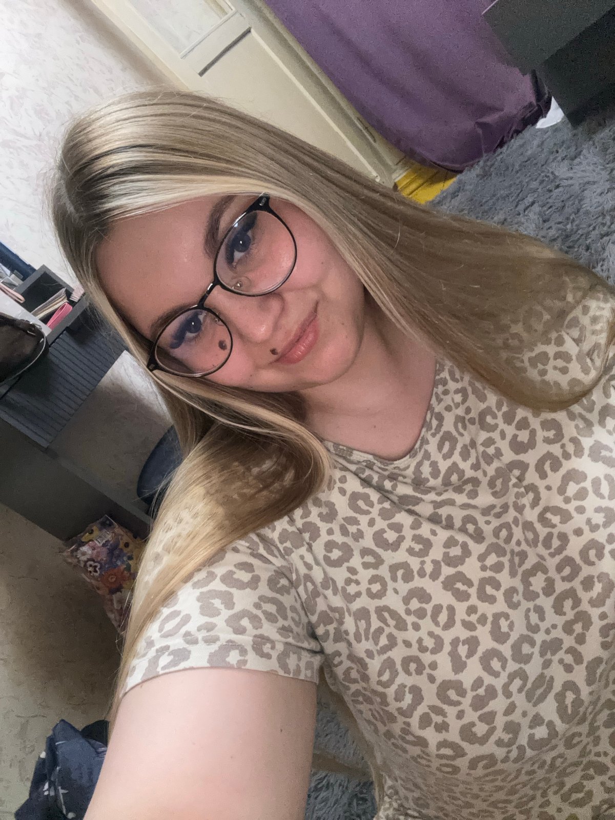 Woman documents evening selfie session at Russian home