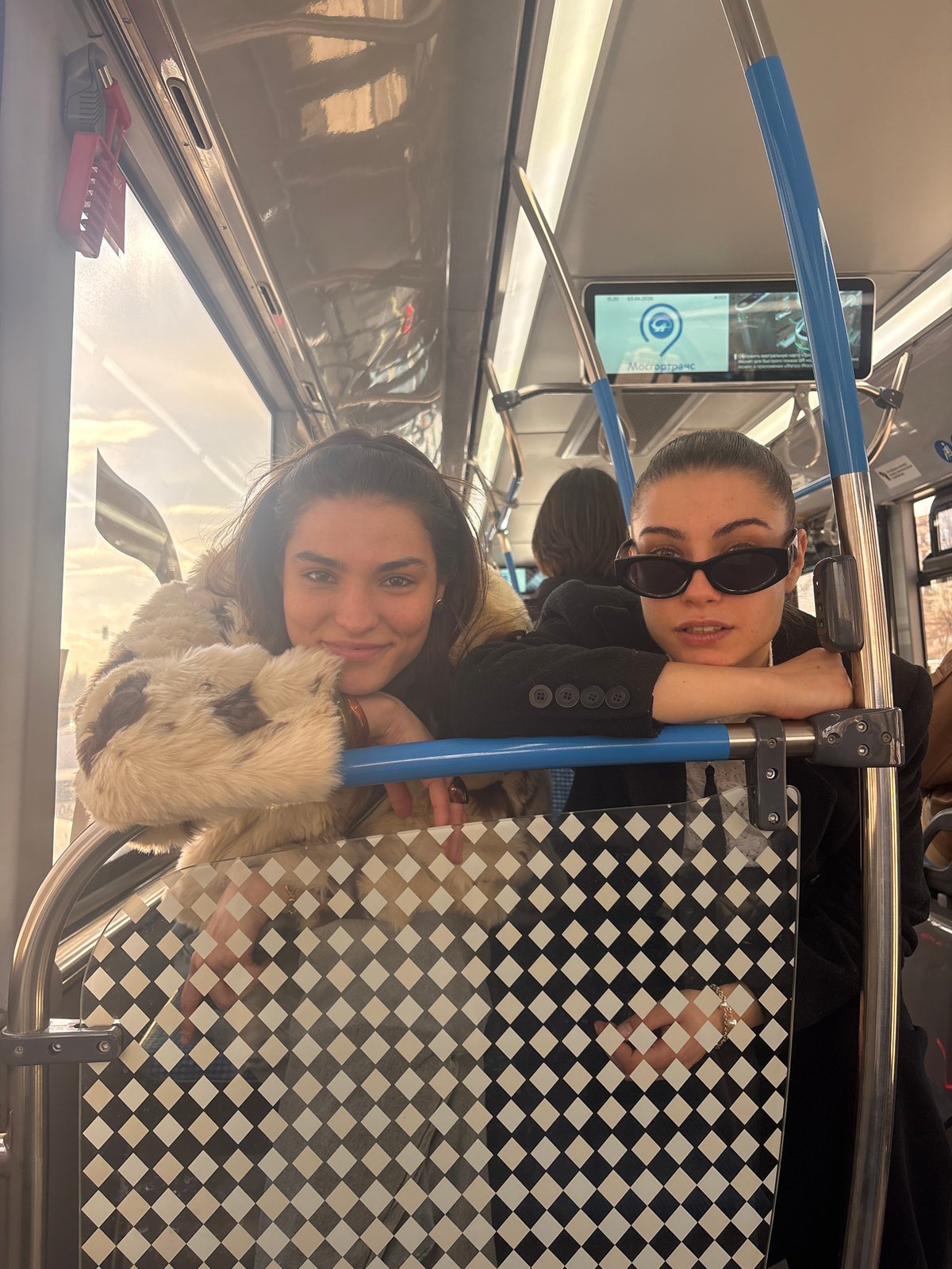 Two women ride Moscow Metro train Friday afternoon