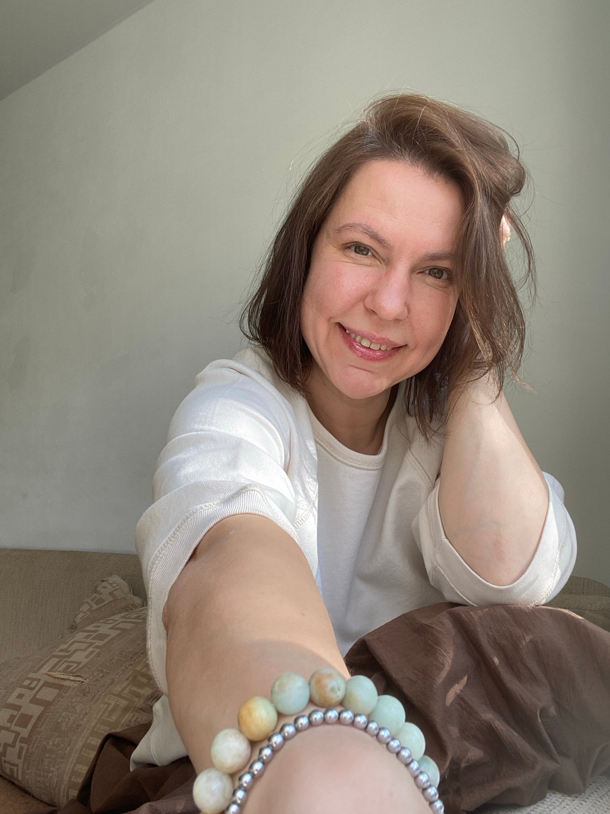 Woman documents morning flower arranging session in Chaikovsky, Russia