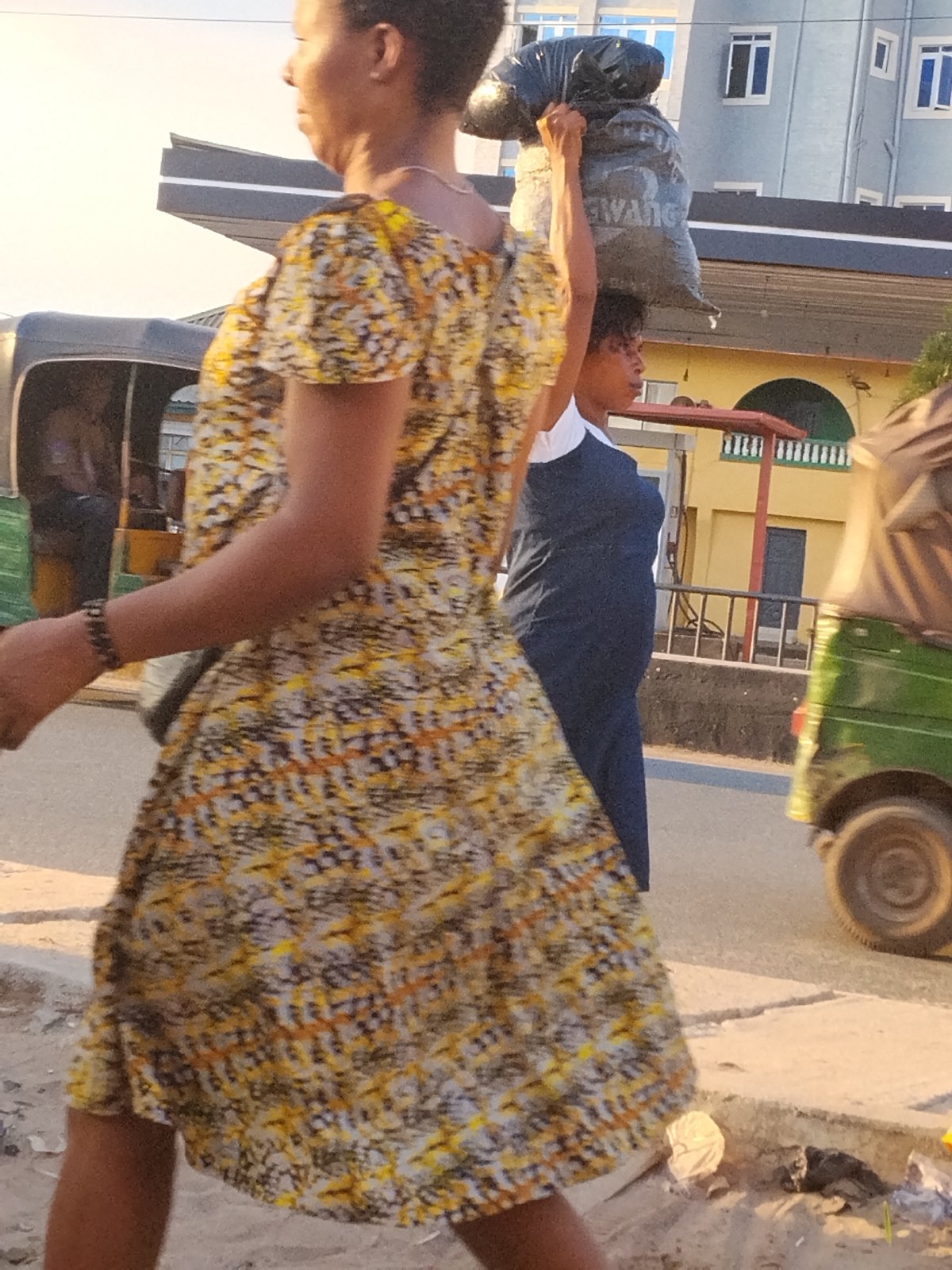 Daily life unfolds on Aba streets during afternoon hours