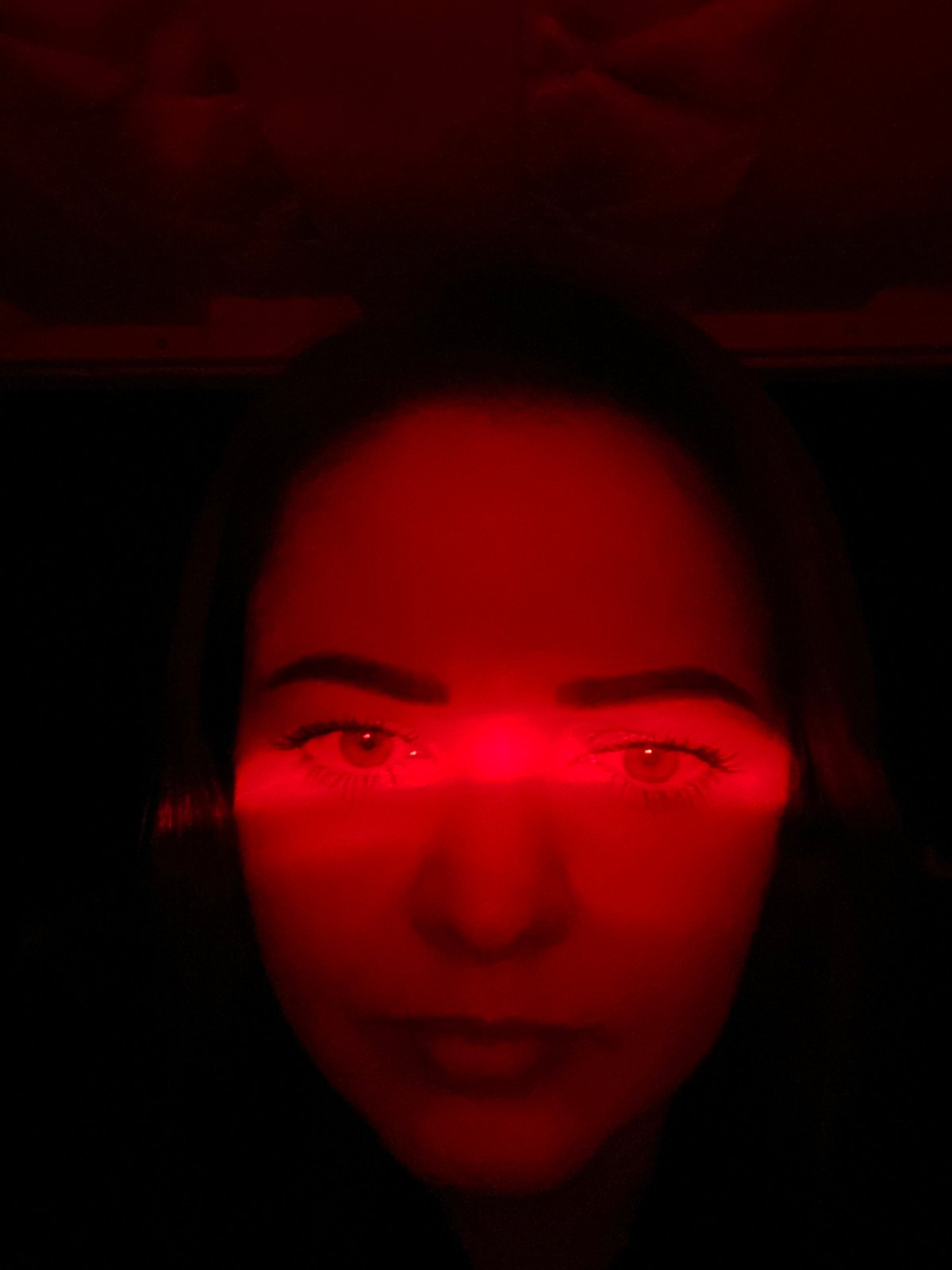 Dramatic red-lit portrait session captured in Yekaterinburg