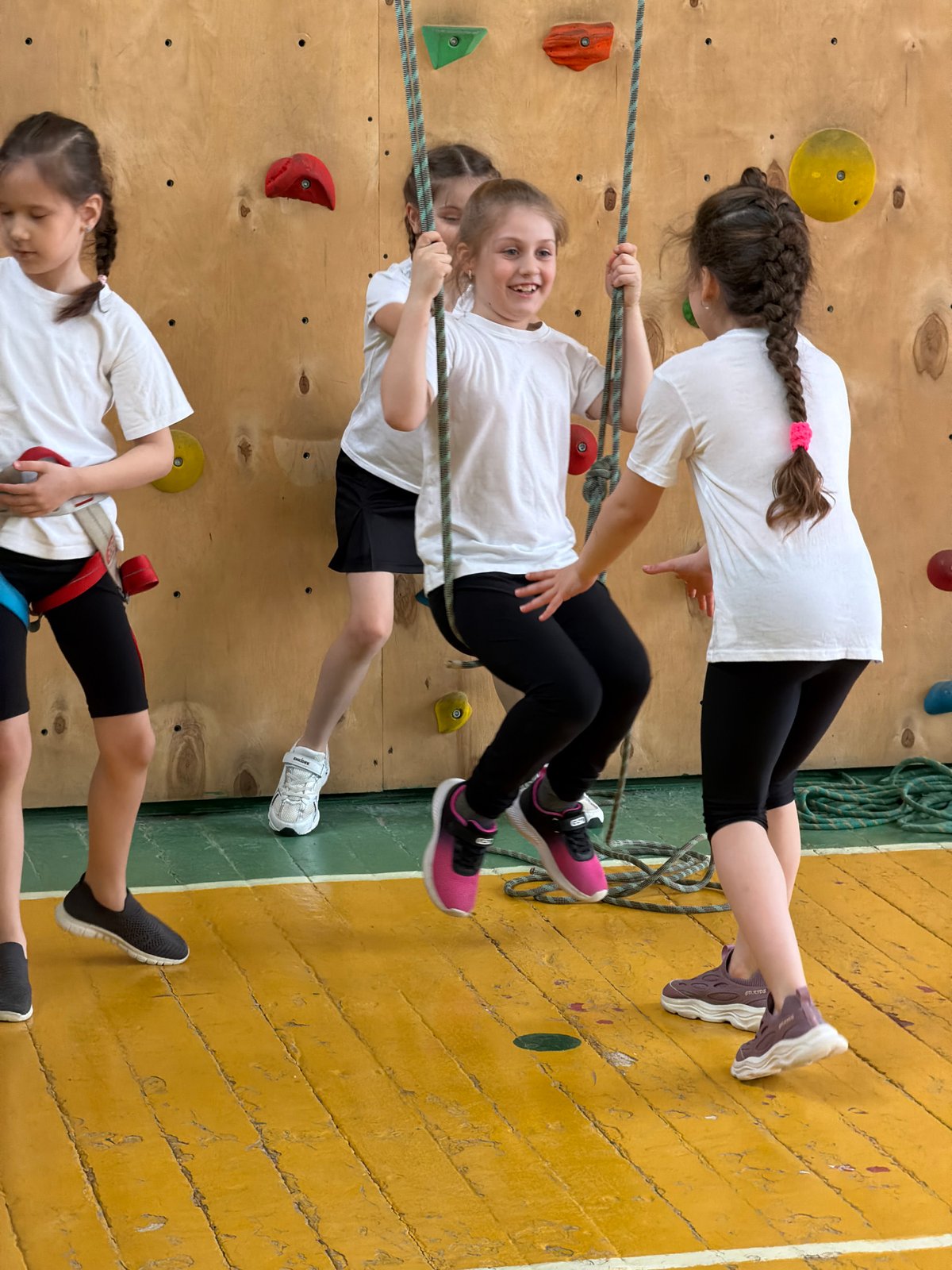 Children practice indoor rock climbing in Izhevsk facility