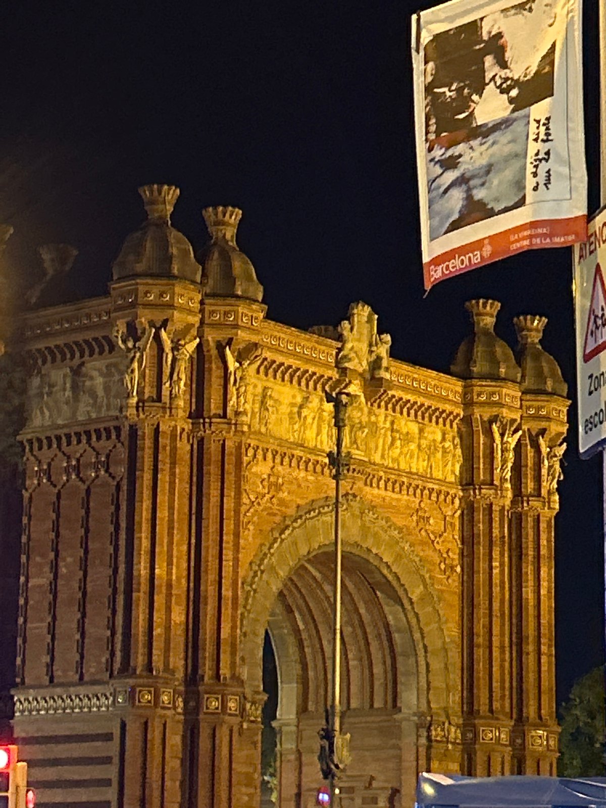 Arc de Triomf illuminated at night in Barcelona
