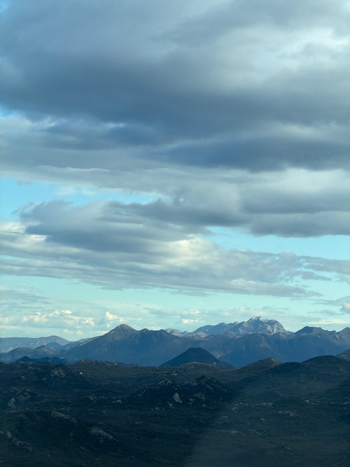 Traveler captures Montenegro mountain vista from roadside vehicle