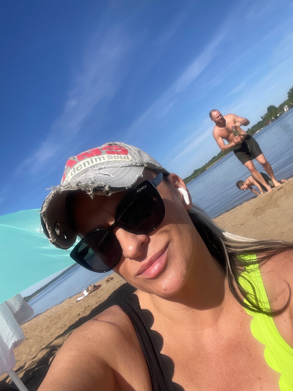 Beach day activities captured at Saratov waterfront during midday