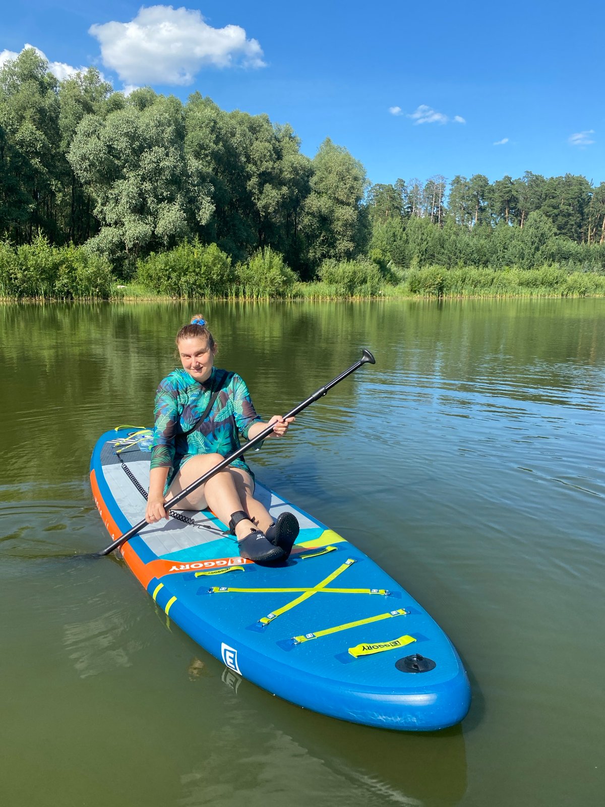 Paddleboarding on a calm lake near Kazan