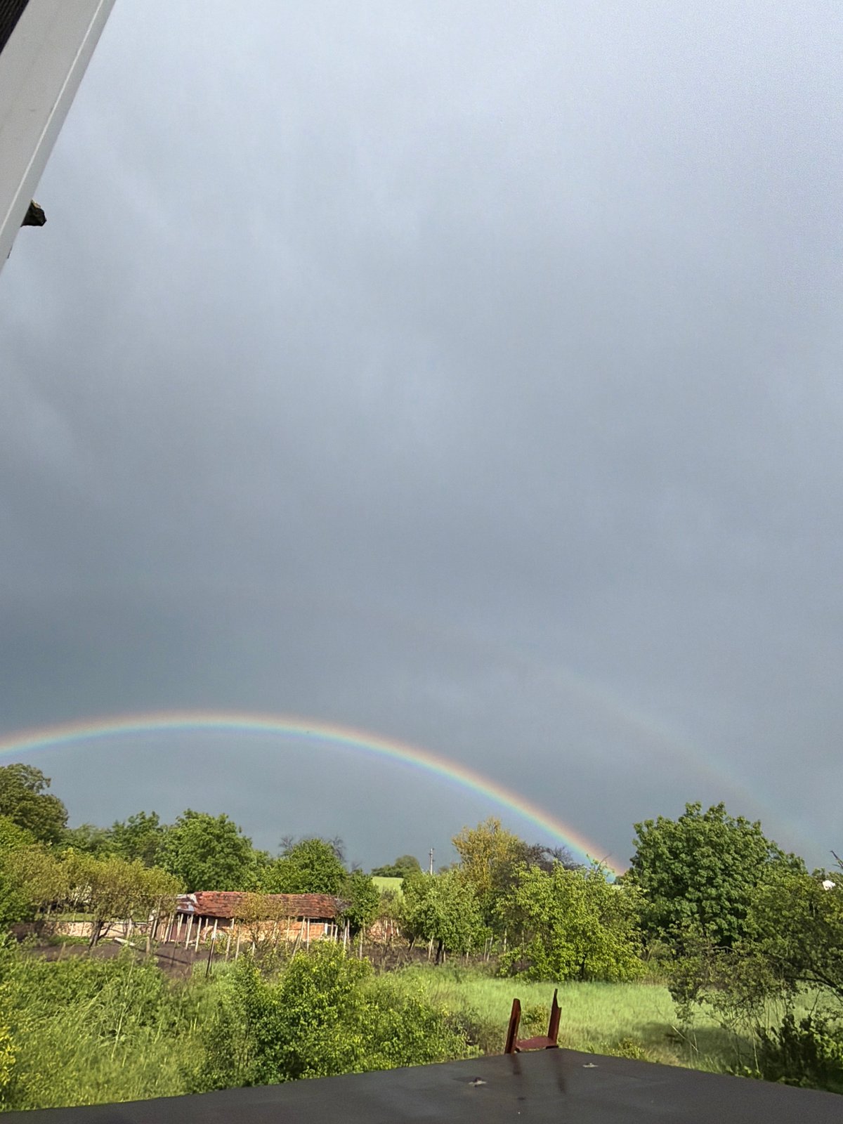 Double rainbow spotted over Rosen, Bulgaria countryside