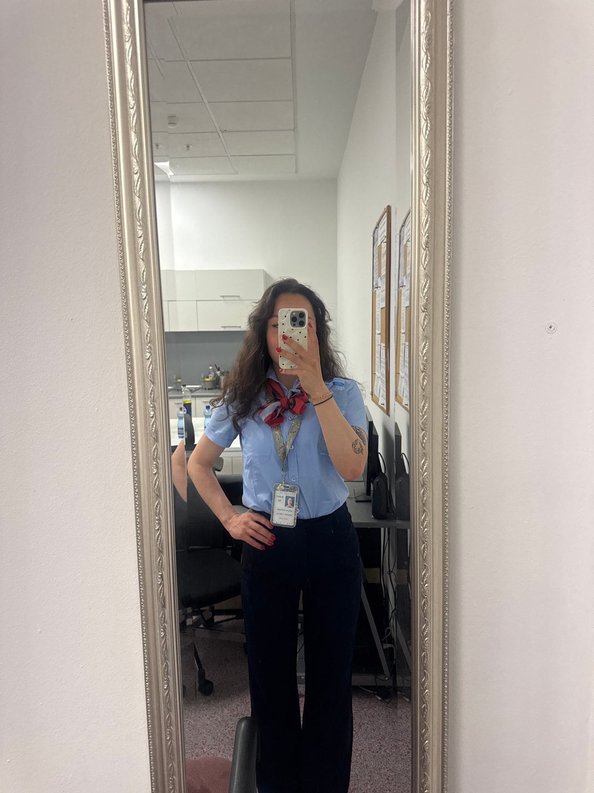 Woman takes mirror selfie in uniform in Burgas
