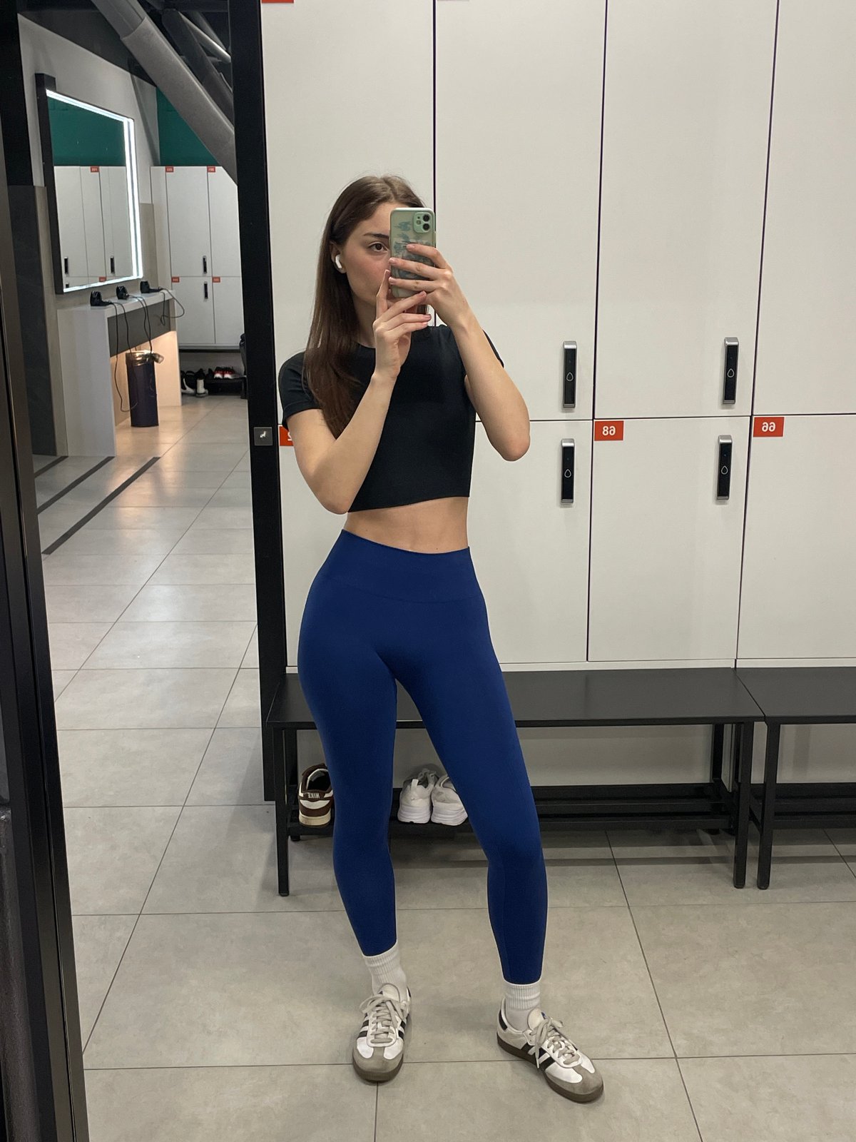Woman takes gym selfie in Moscow locker room
