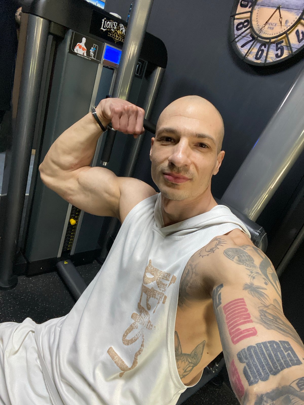 Tattooed man photographed at fitness center in Pleven