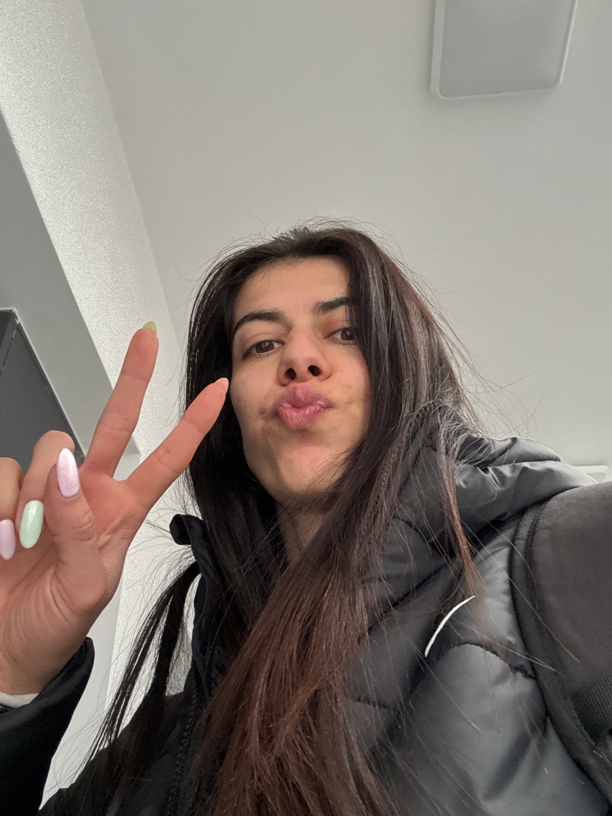 Woman takes elevator selfies in Sofia