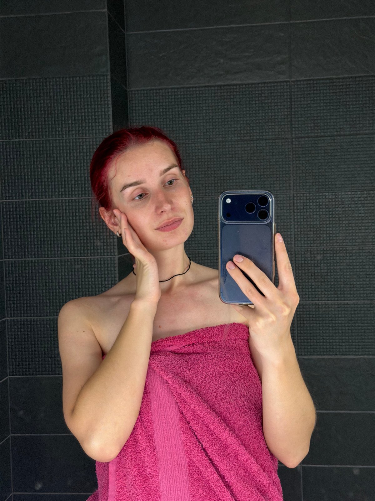 Red-haired woman photographed in various Chaikovsky settings during evening hours
