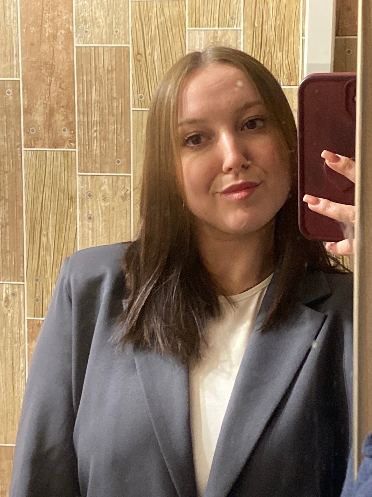 Woman documents afternoon outing through selfies in Chaikovsky, Russia