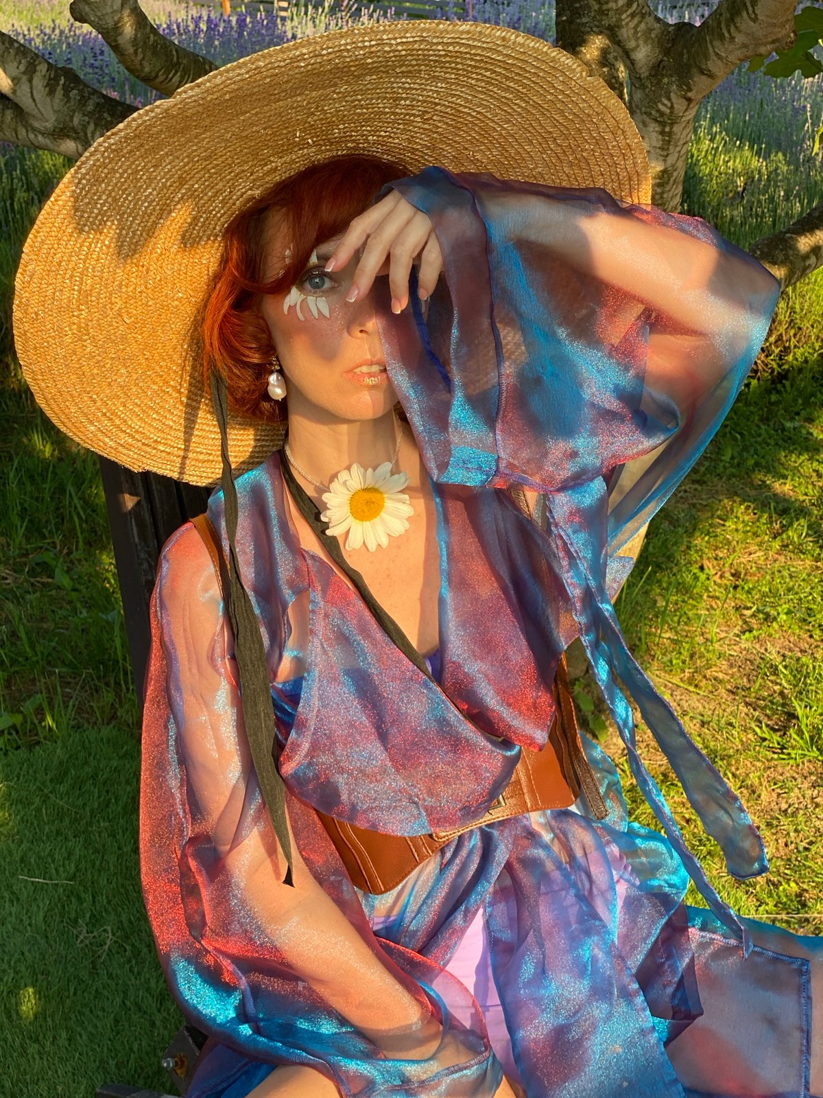 Styled photoshoot in a lavender field with elaborate summer looks