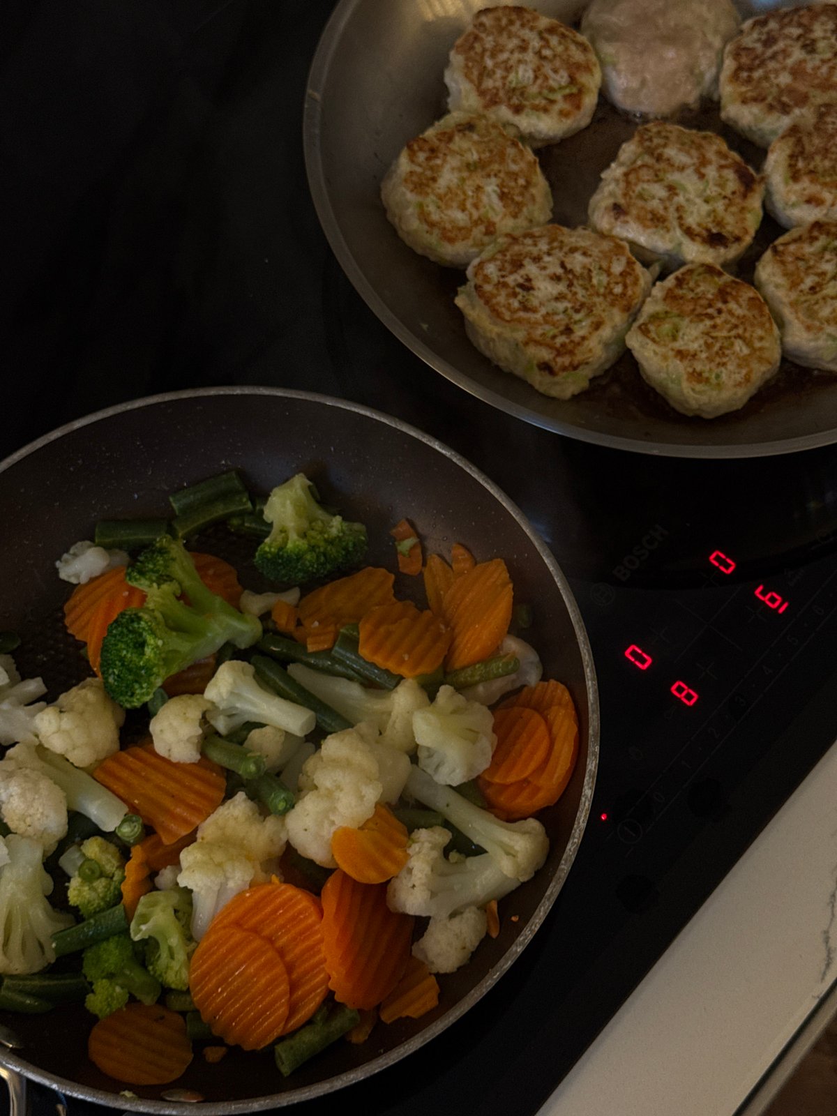 Home cooking scene captured on Moscow induction cooktop