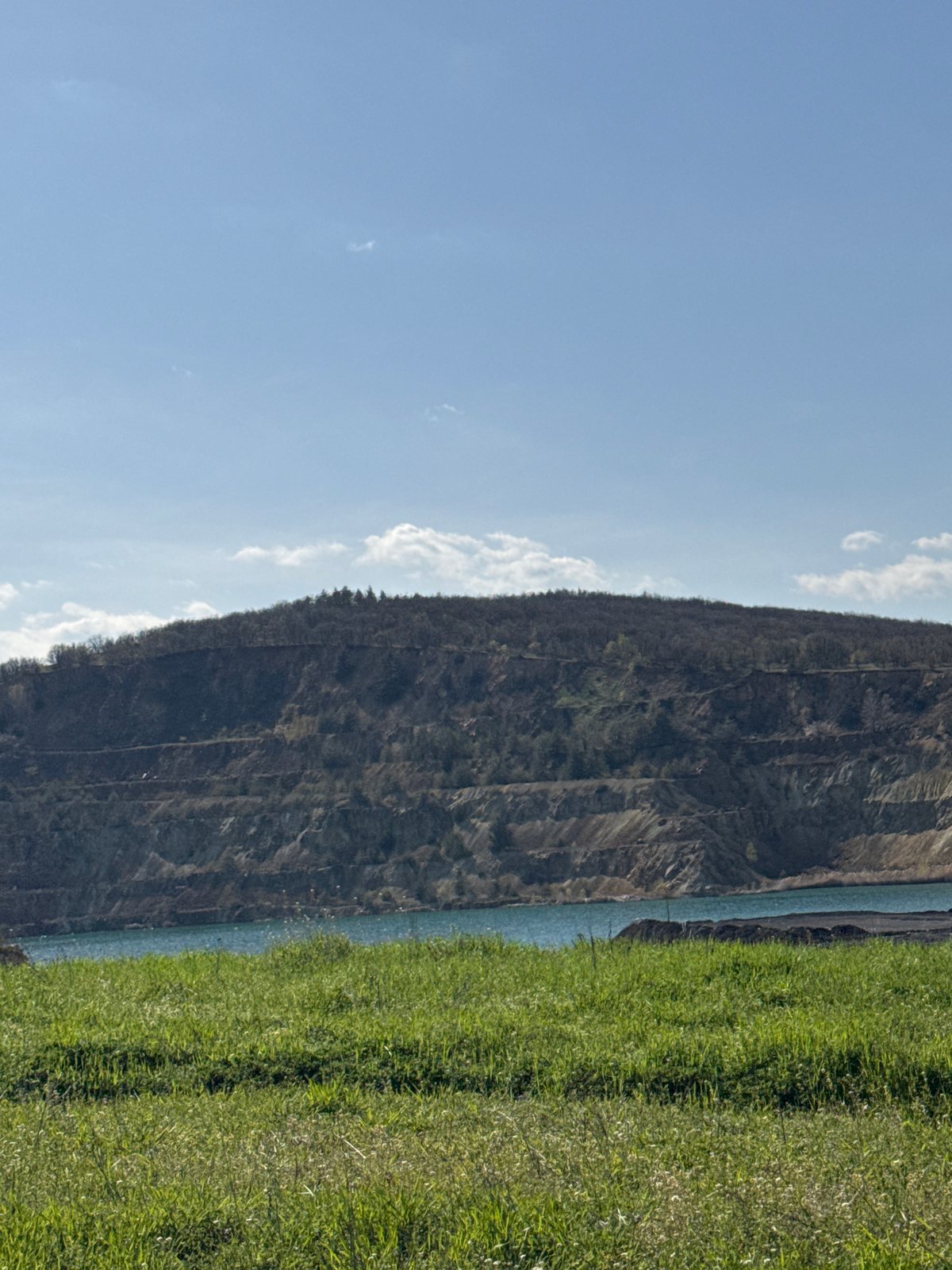 Mountain landscape with blue sky and vegetation documented