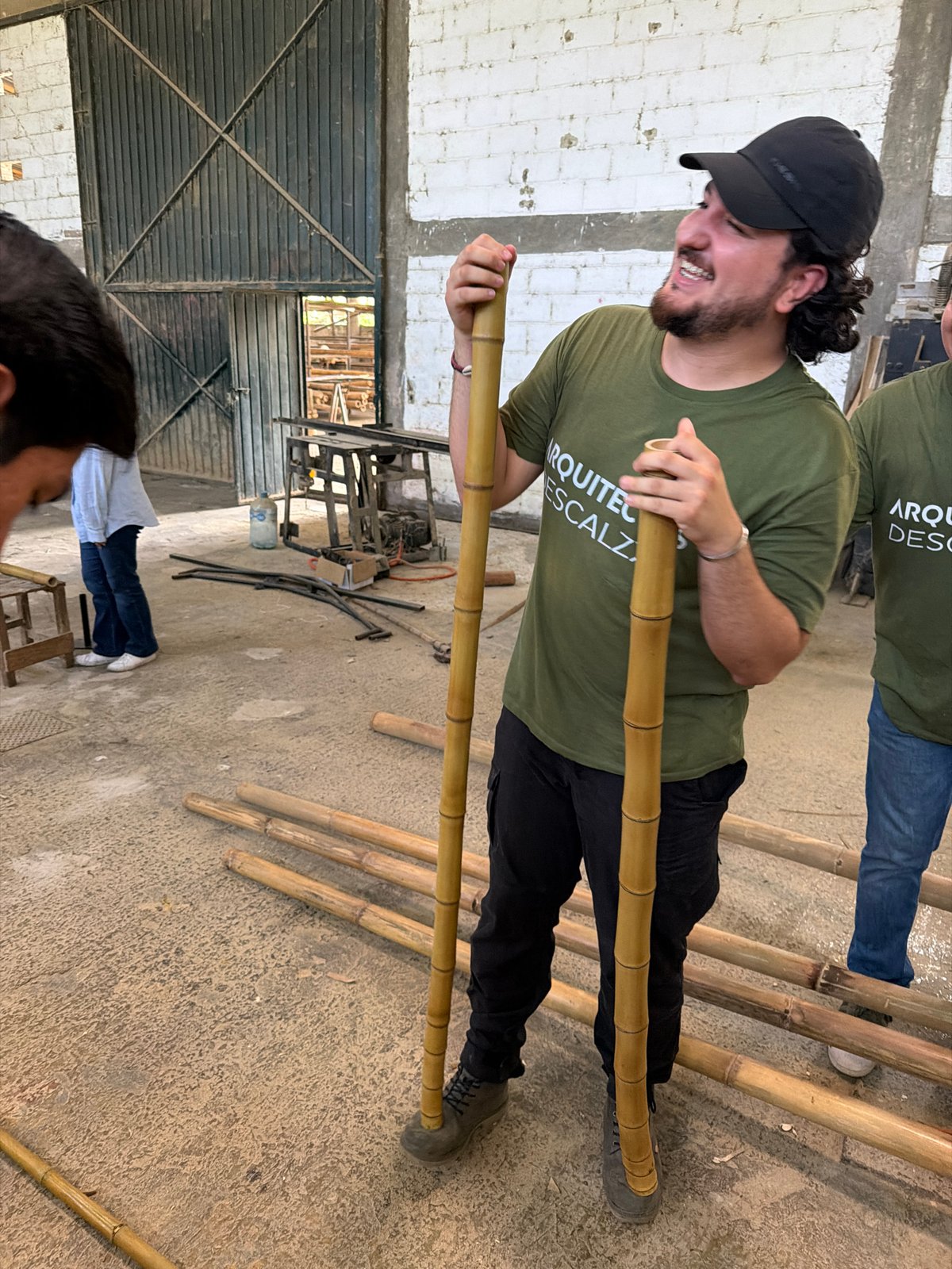 Man with bamboo items observed in Equimita workshop