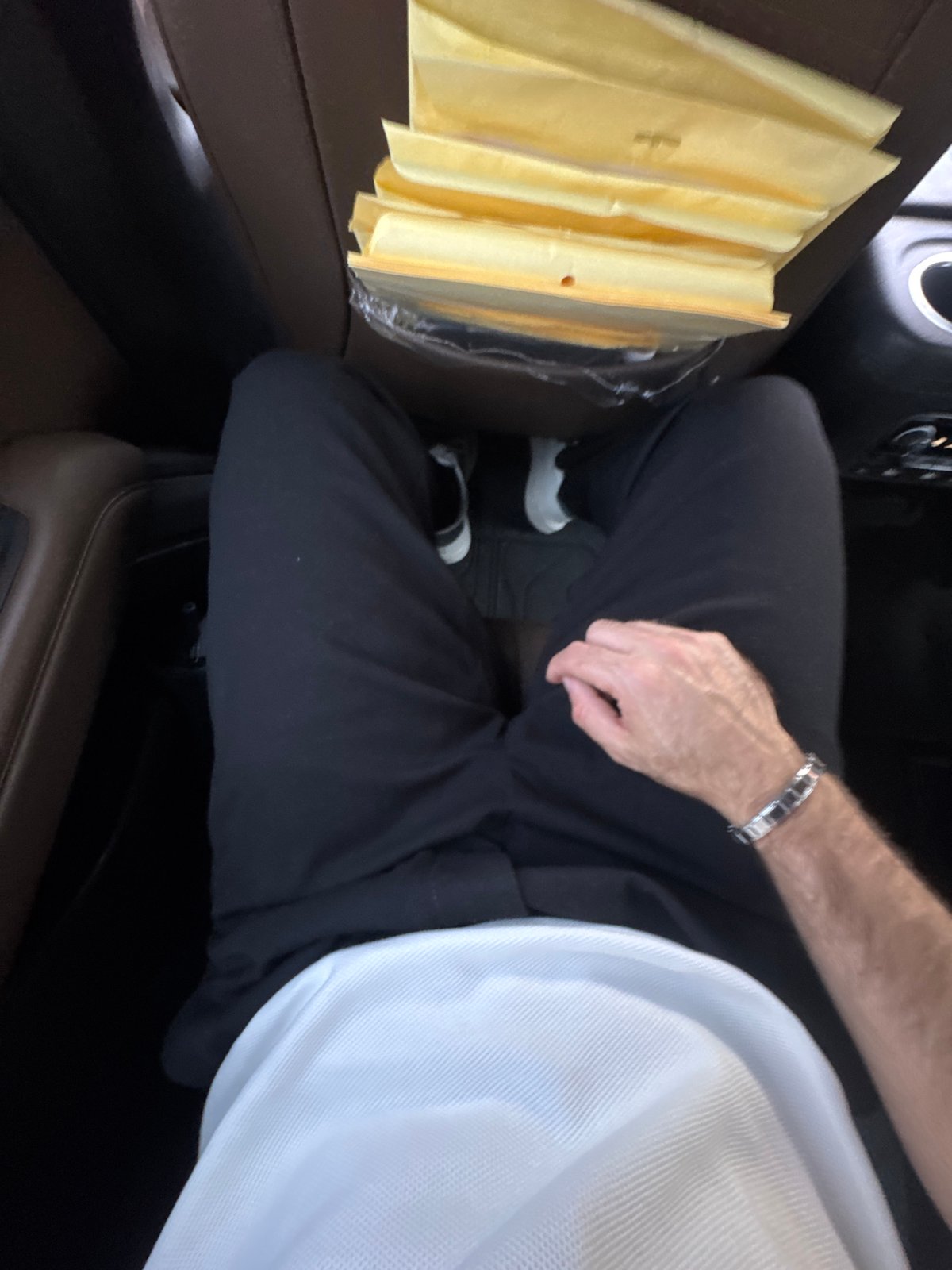 Vehicle interior documented in Mexico City showing passenger, objects