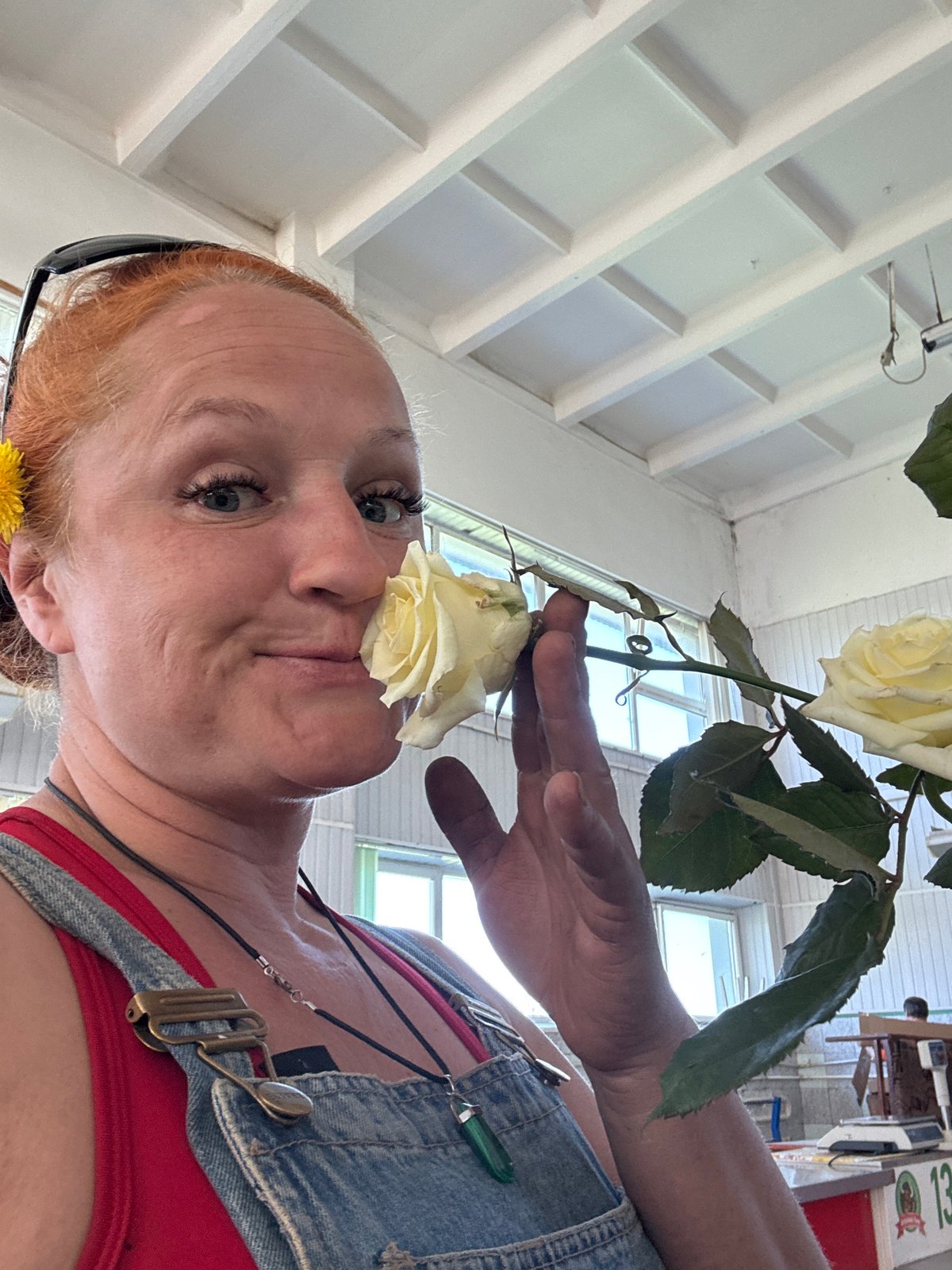 Woman poses with roses during early morning photoshoot in Chaikovsky