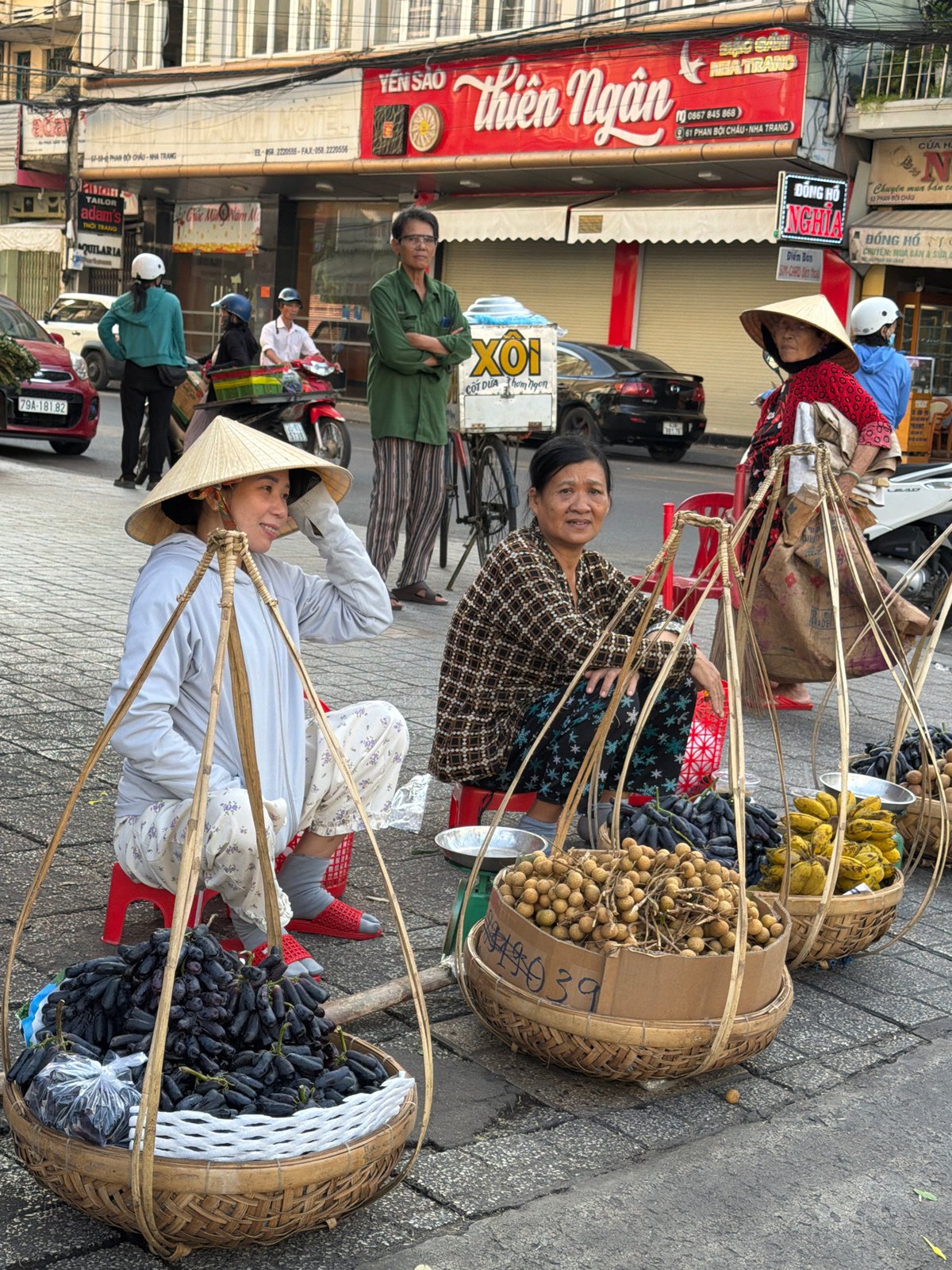 Street vendors, scooters, and daily commerce in Nha Trang