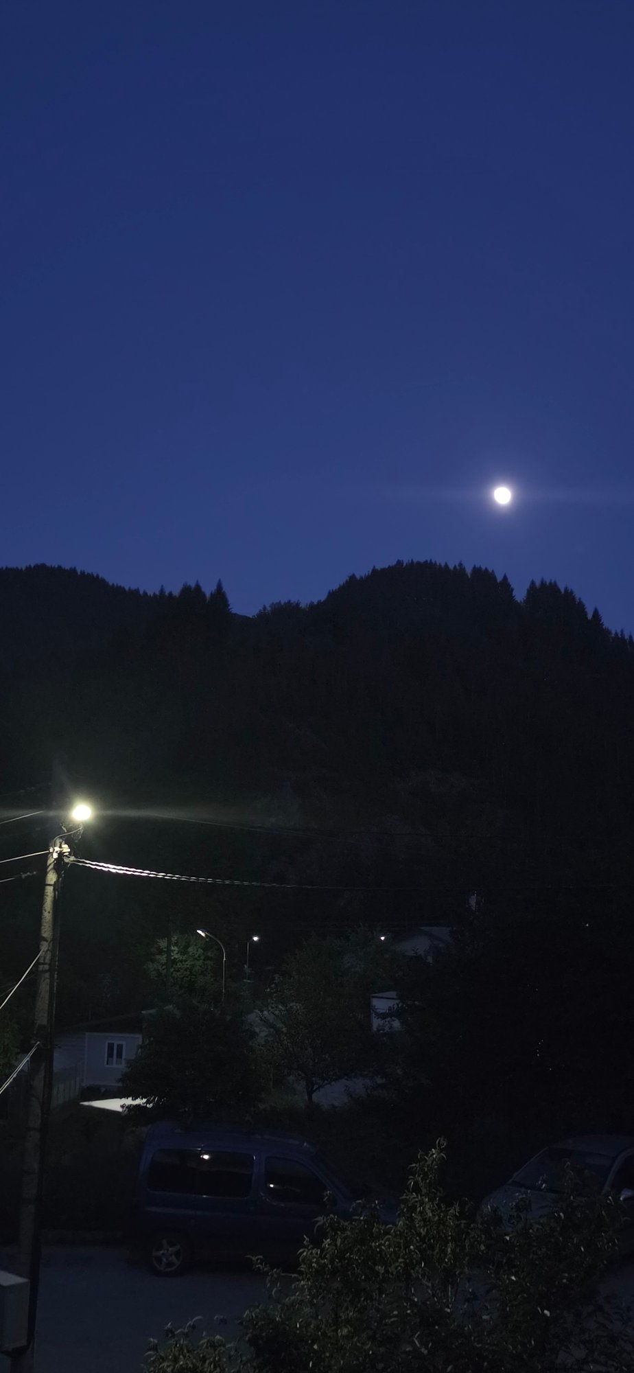 Full moon observed over Rudozem, Bulgaria residential area