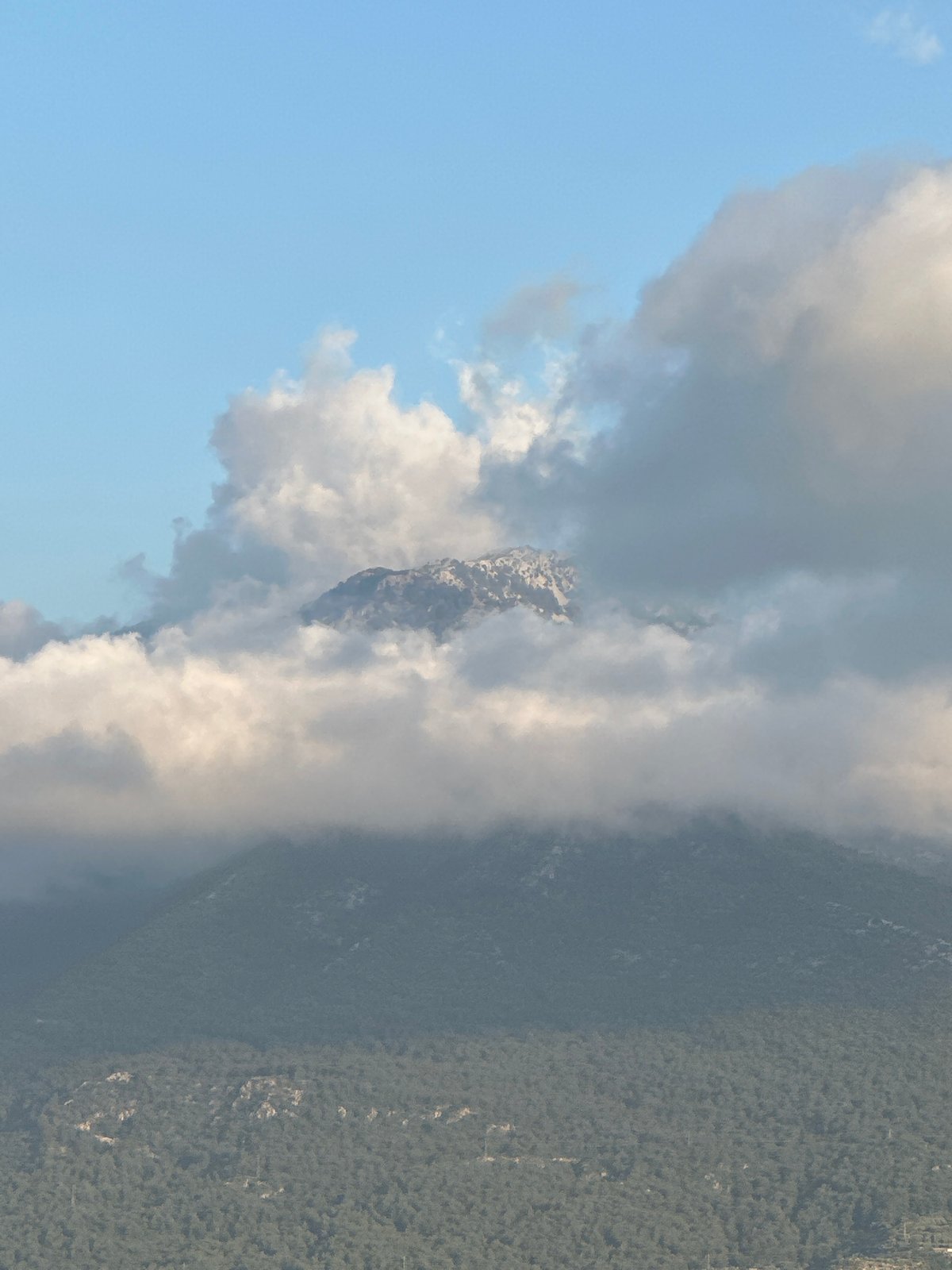 Woman documents afternoon in Fethiye, Turkey with selfies and cityscapes