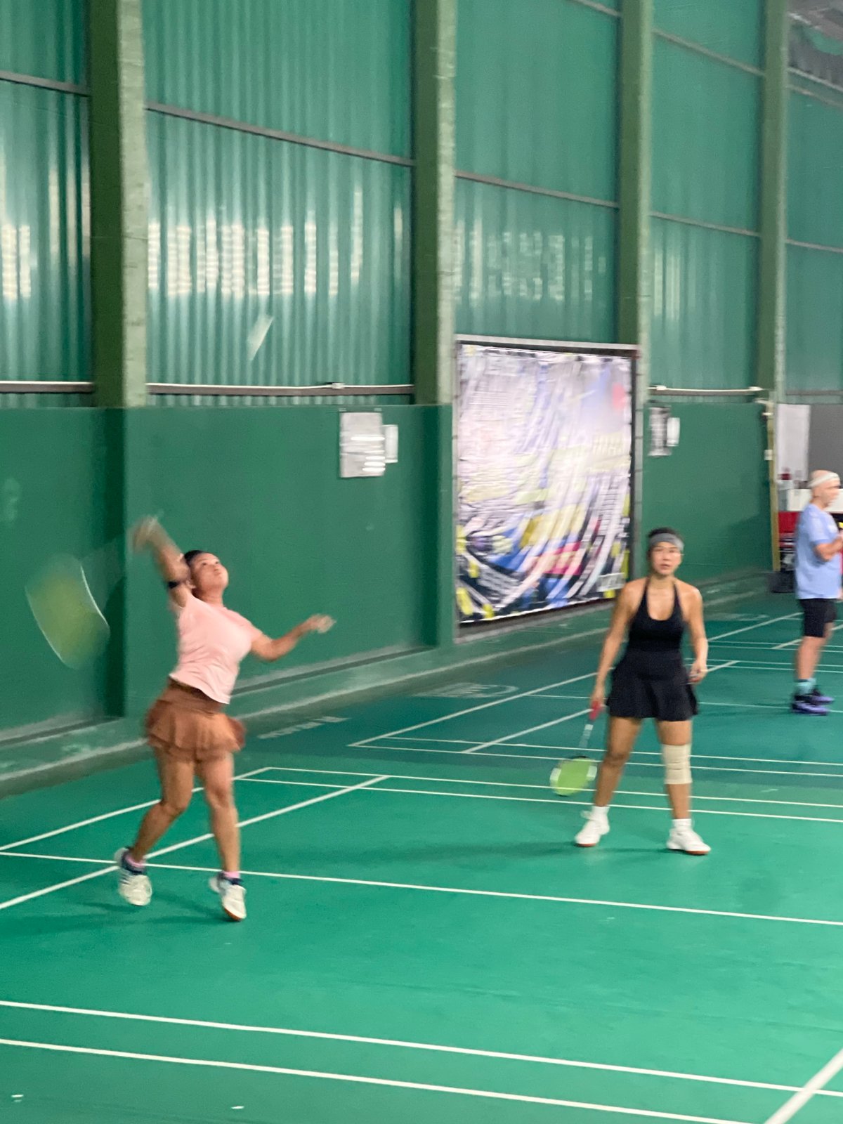 Badminton tournament organized at indoor court in Thailand