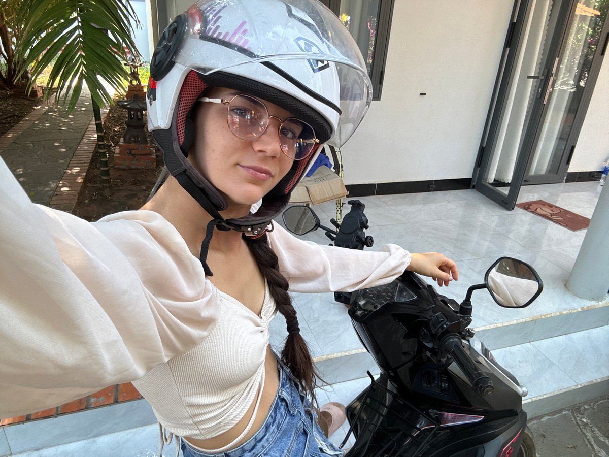 Woman in motorcycle helmet spotted indoors in Mũi Né