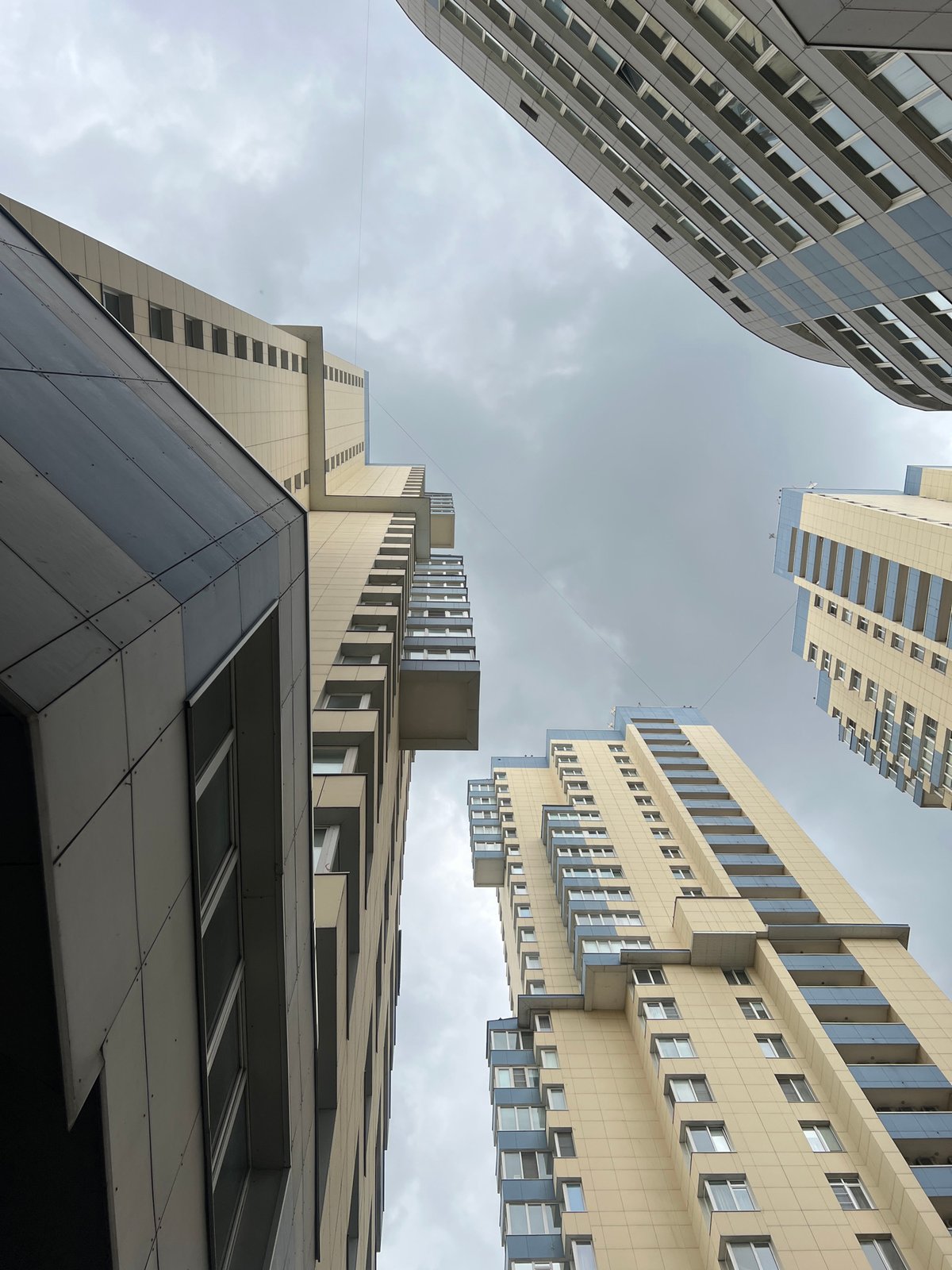 Modern Moscow apartment complex documented under overcast skies