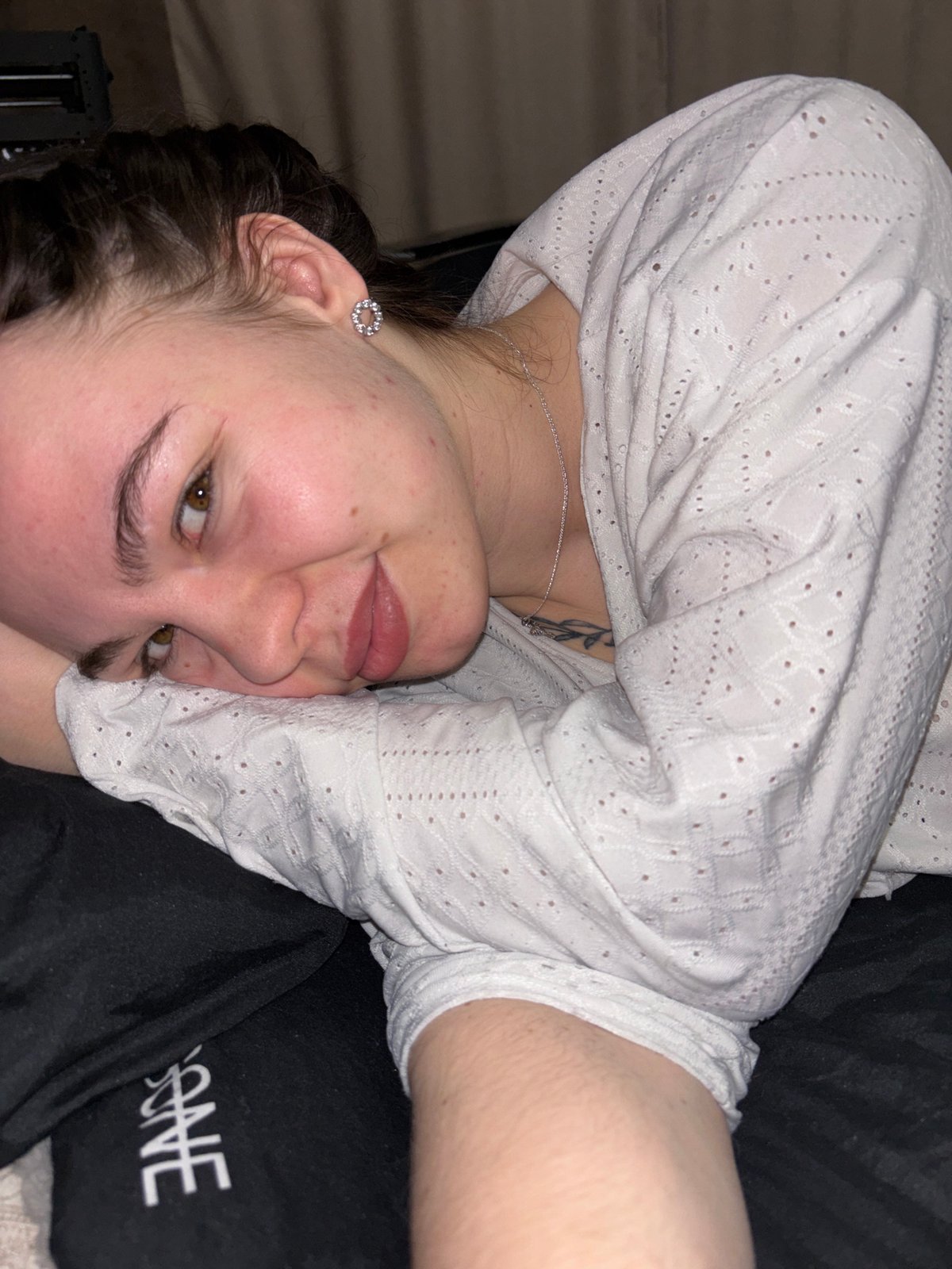 Person takes selfie on floor during video call in Perm