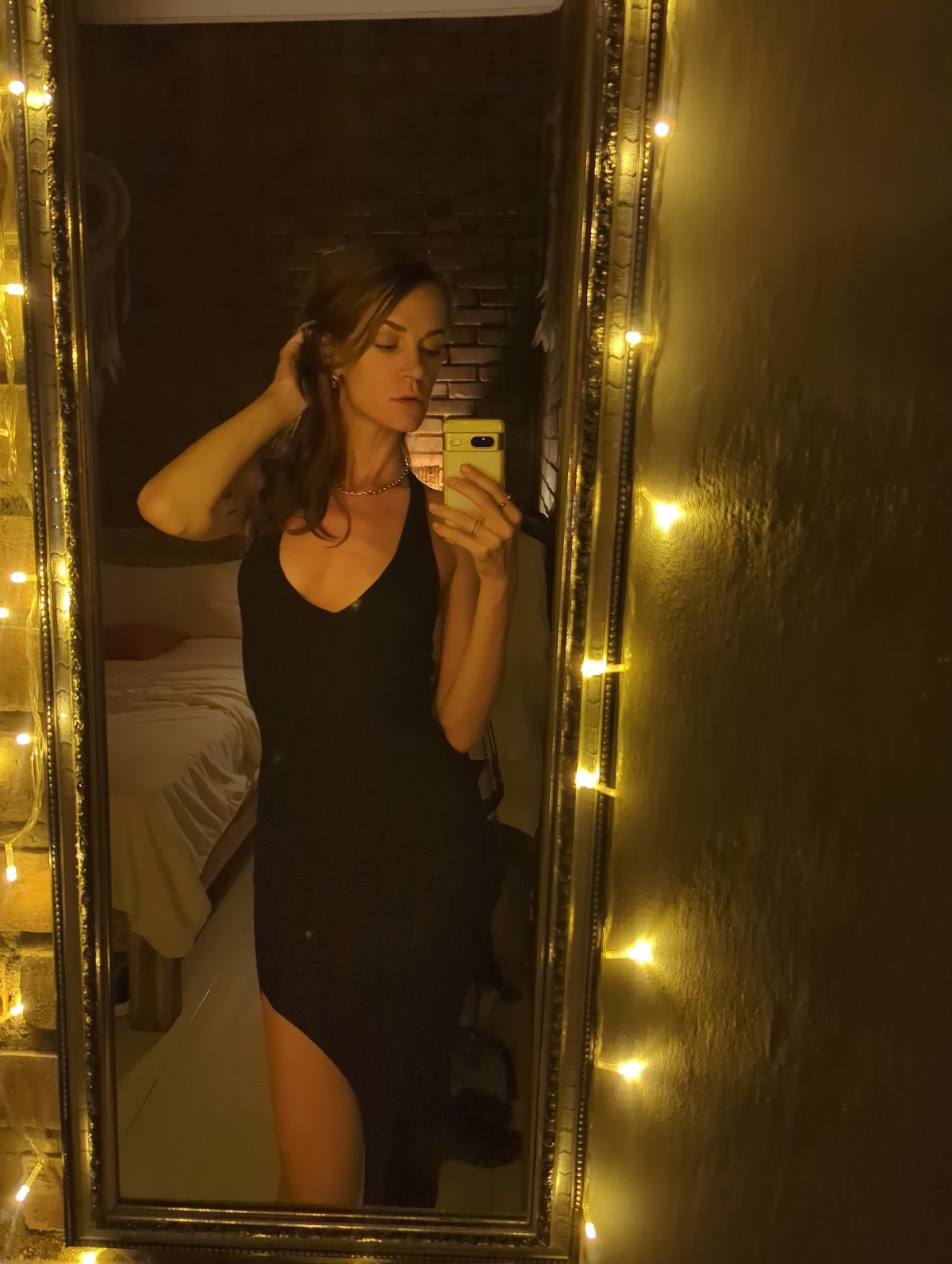 Woman takes mirror selfies in decorated North Kuta residence