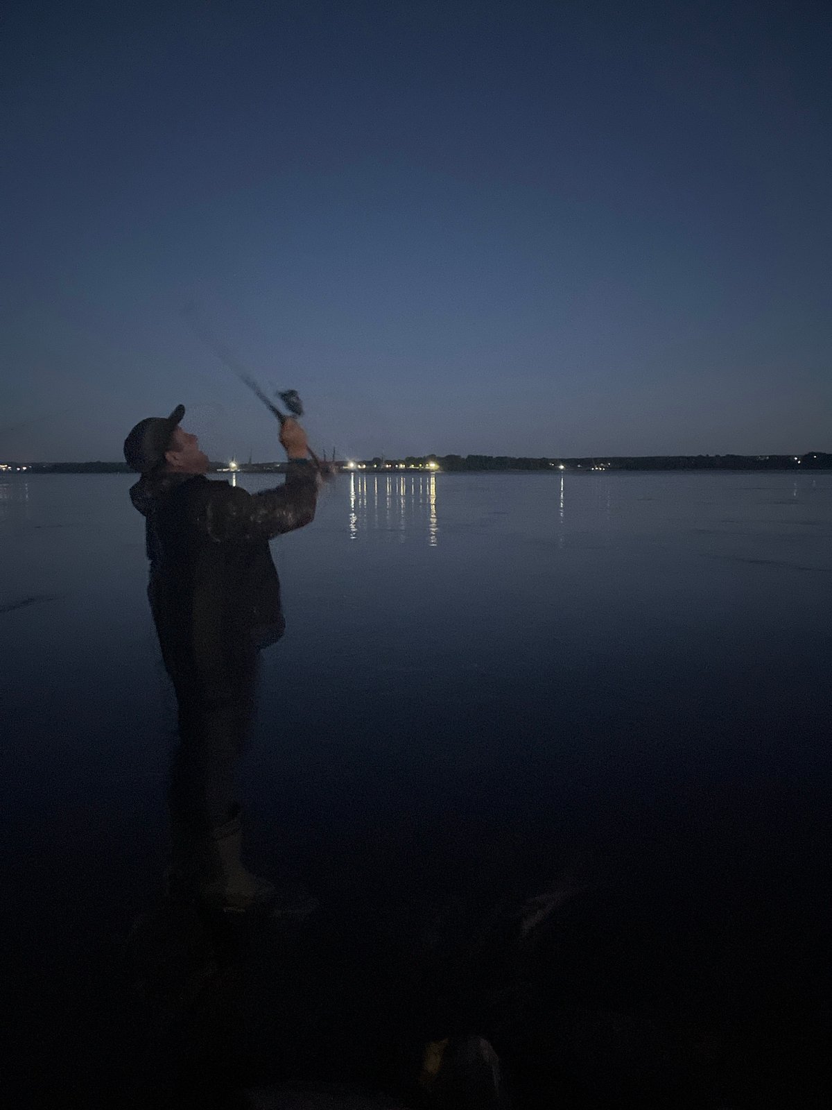 Evening fishing gathering at Chaikovsky dam draws multiple anglers