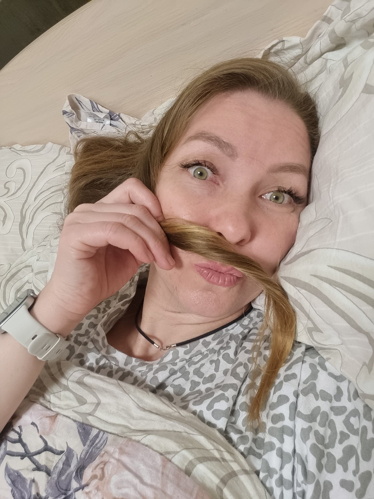 Woman photographed in intimate bedroom moments in Chaikovsky